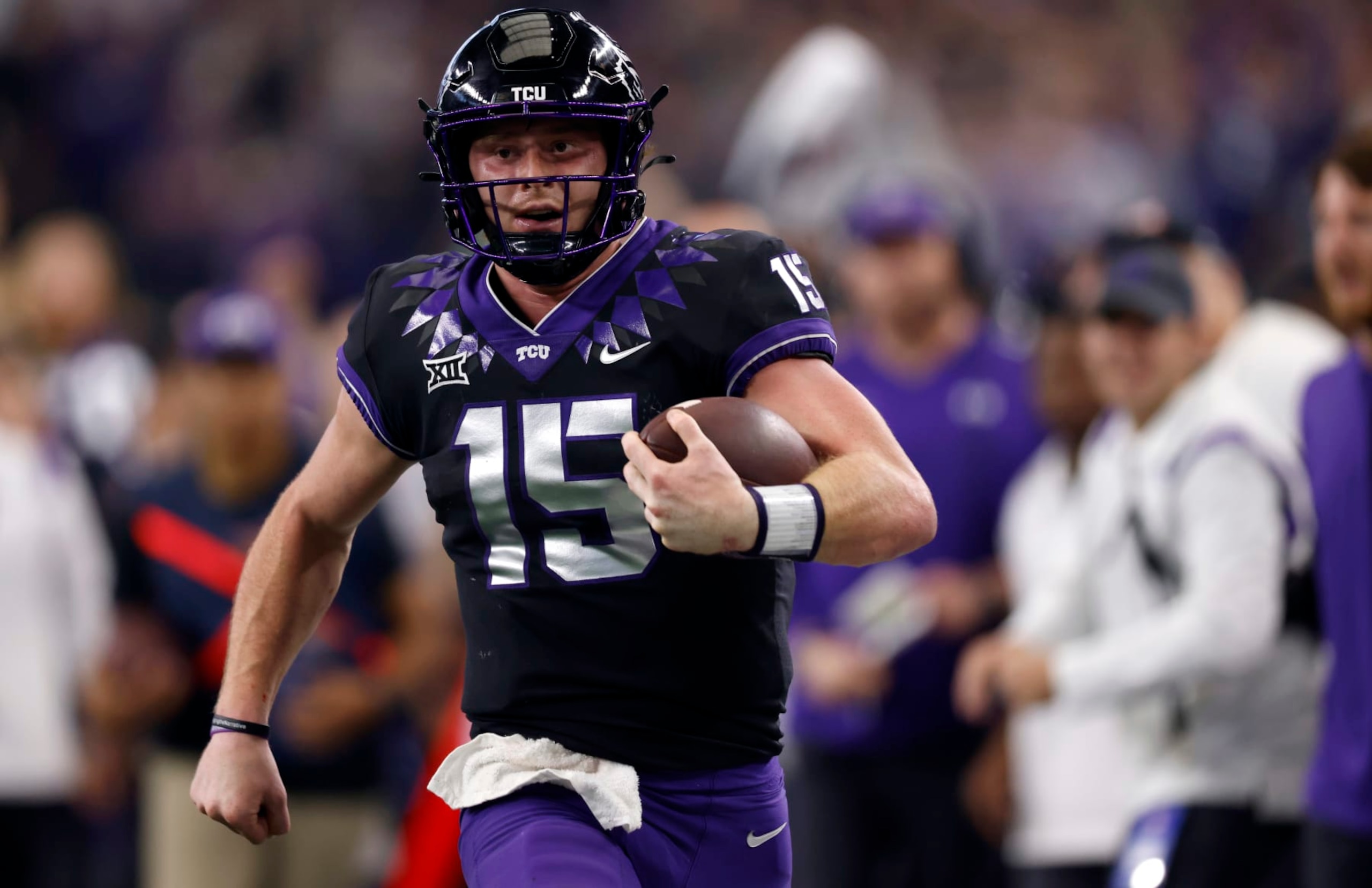 ARLINGTON, TX - DECEMBER 3: Max Duggan #15 of the TCU Horned Frogs carries the ball against the Kansas State Wildcats in the second half of the Big 12 Football Championship at AT&T Stadium on December 3, 2022 in Arlington, Texas. Kansas State won 31-28 in overtime. (Photo by Ron Jenkins/Getty Images)