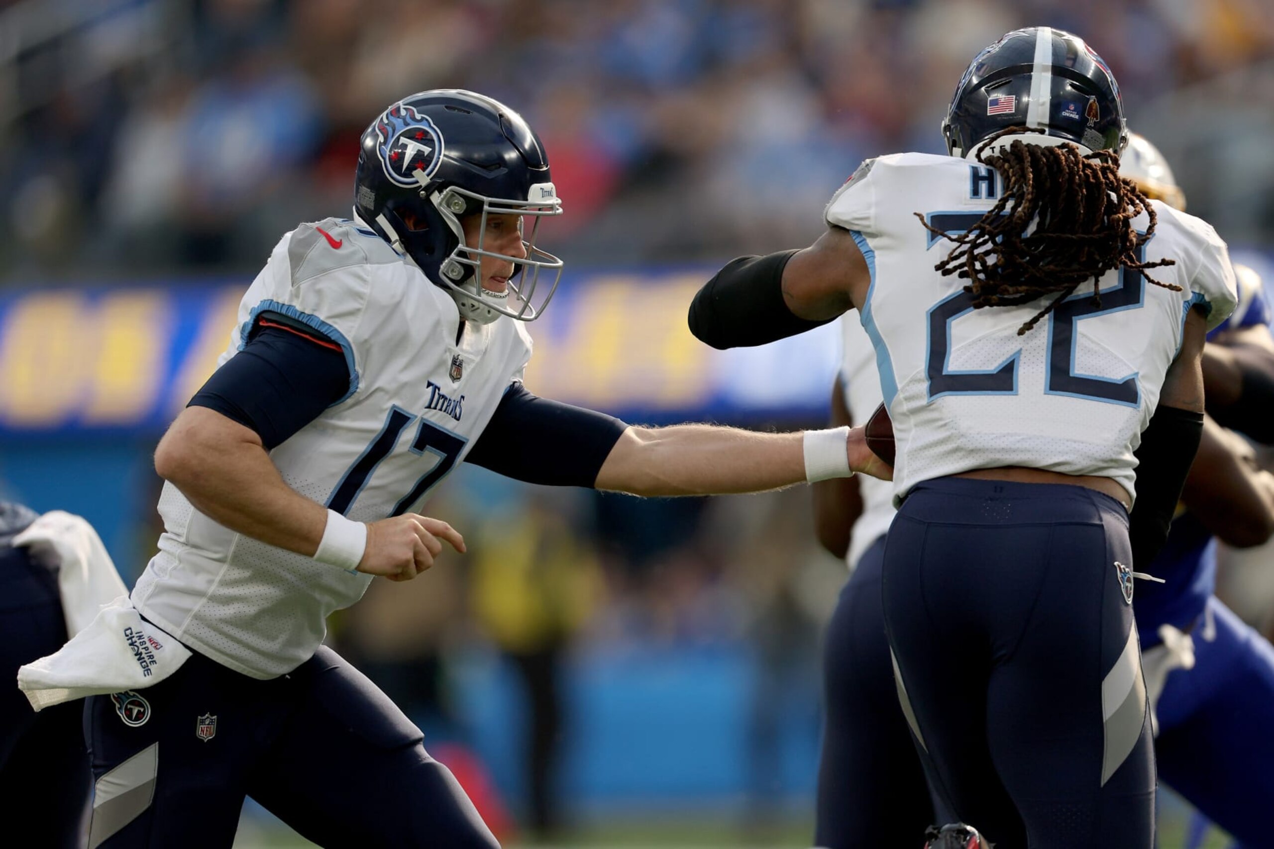 INGLEWOOD, CALIFORNIA - DECEMBER 18: Ryan Tannehill #17 of the Tennessee Titans hands off the ball to Derrick Henry #22 during the first half of the game against the Los Angeles Chargers at SoFi Stadium on December 18, 2022 in Inglewood, California. (Photo by Harry How/Getty Images)