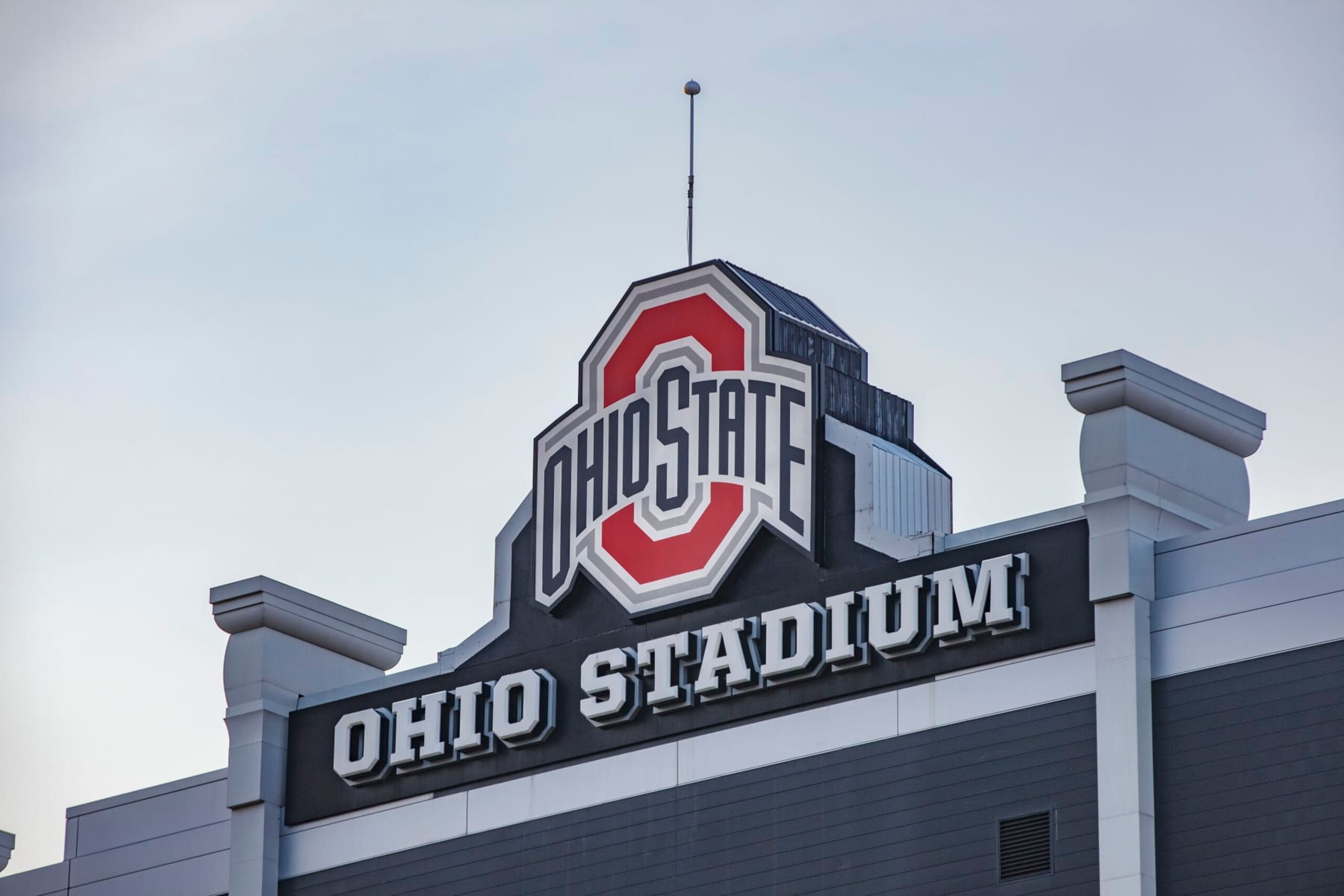 COLUMBUS, OHIO, UNITED STATES - 2021/07/21: The Ohio State University logo at the top of the Ohio Stadium at sunset, during a summer day on The Ohio State University campus. (Photo by Stephen Zenner/SOPA Images/LightRocket via Getty Images)