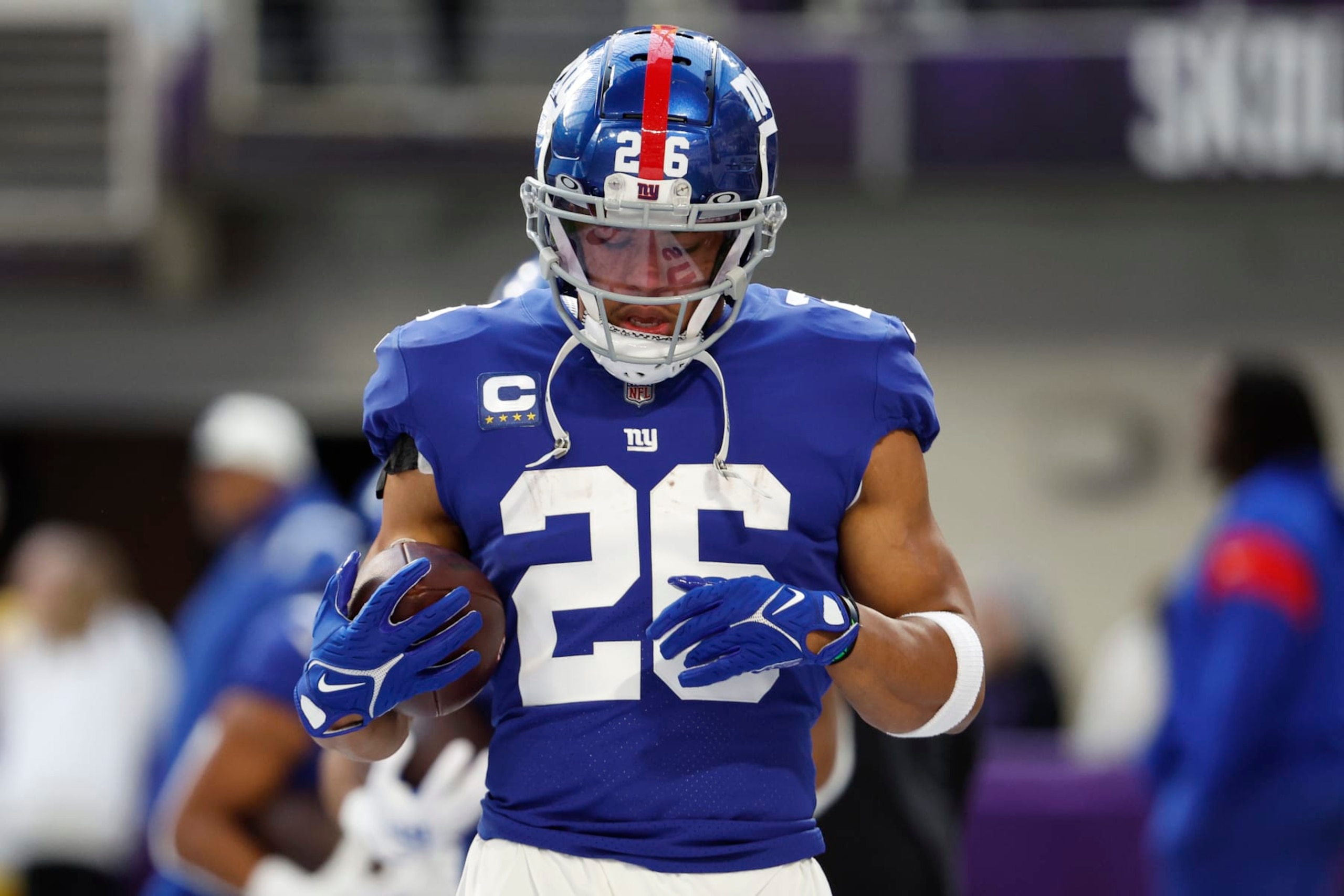 MINNEAPOLIS, MINNESOTA - DECEMBER 24: Saquon Barkley #26 of the New York Giants warms up against the Minnesota Vikings at U.S. Bank Stadium on December 24, 2022 in Minneapolis, Minnesota. (Photo by David Berding/Getty Images) MINNEAPOLIS, MINNESOTA - DECEMBER 24: Saquon Barkley #26 of the New York Giants warms up against the Minnesota Vikings at U.S. Bank Stadium on December 24, 2022 in Minneapolis, Minnesota. (Photo by David Berding/Getty Images)
