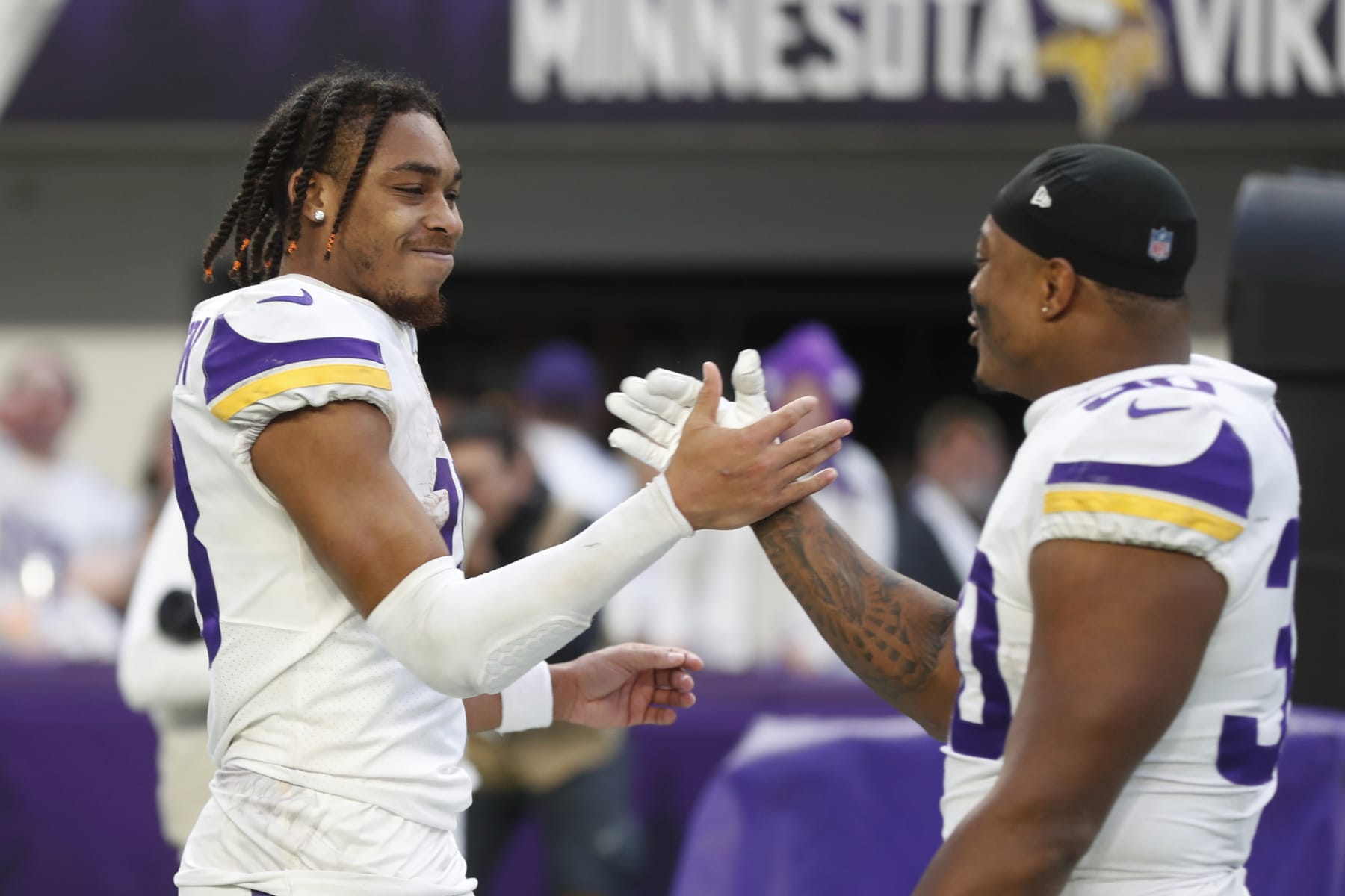 Justin Jefferson (left) and C.J. Ham (right)