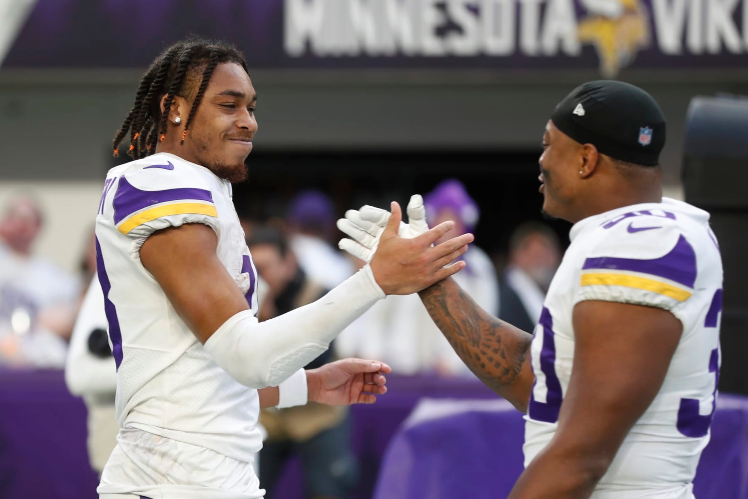 Justin Jefferson (left) and C.J. Ham (right) Justin Jefferson (left) and C.J. Ham (right)