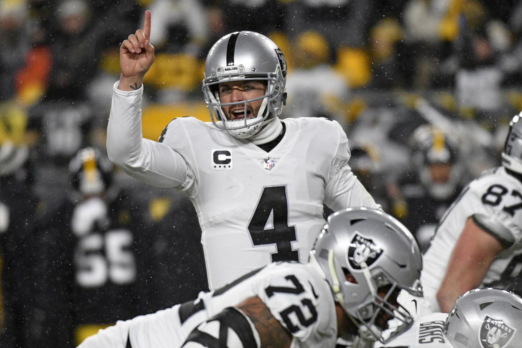 Las Vegas Raiders quarterback Derek Carr (4) calls signals during the first half of an NFL football game against the Pittsburgh Steelers in Pittsburgh, Saturday, Dec. 24, 2022. (AP Photo/Don Wright)