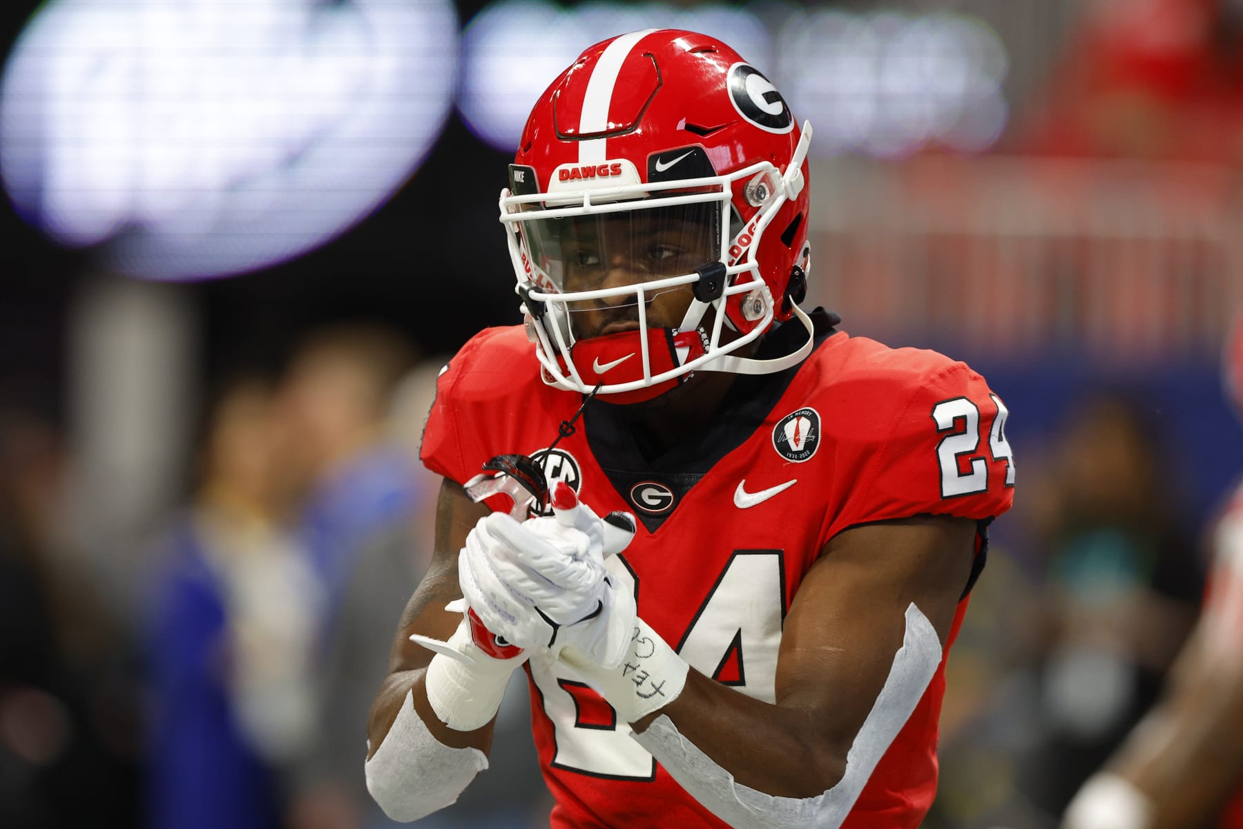 ATLANTA, GA - DECEMBER 03: Malaki Starks #24 of the Georgia Bulldogs warms up prior to the game against the LSU Tigers in the SEC Championship game at Mercedes-Benz Stadium on December 3, 2022 in Atlanta, Georgia. (Photo by Todd Kirkland/Getty Images)