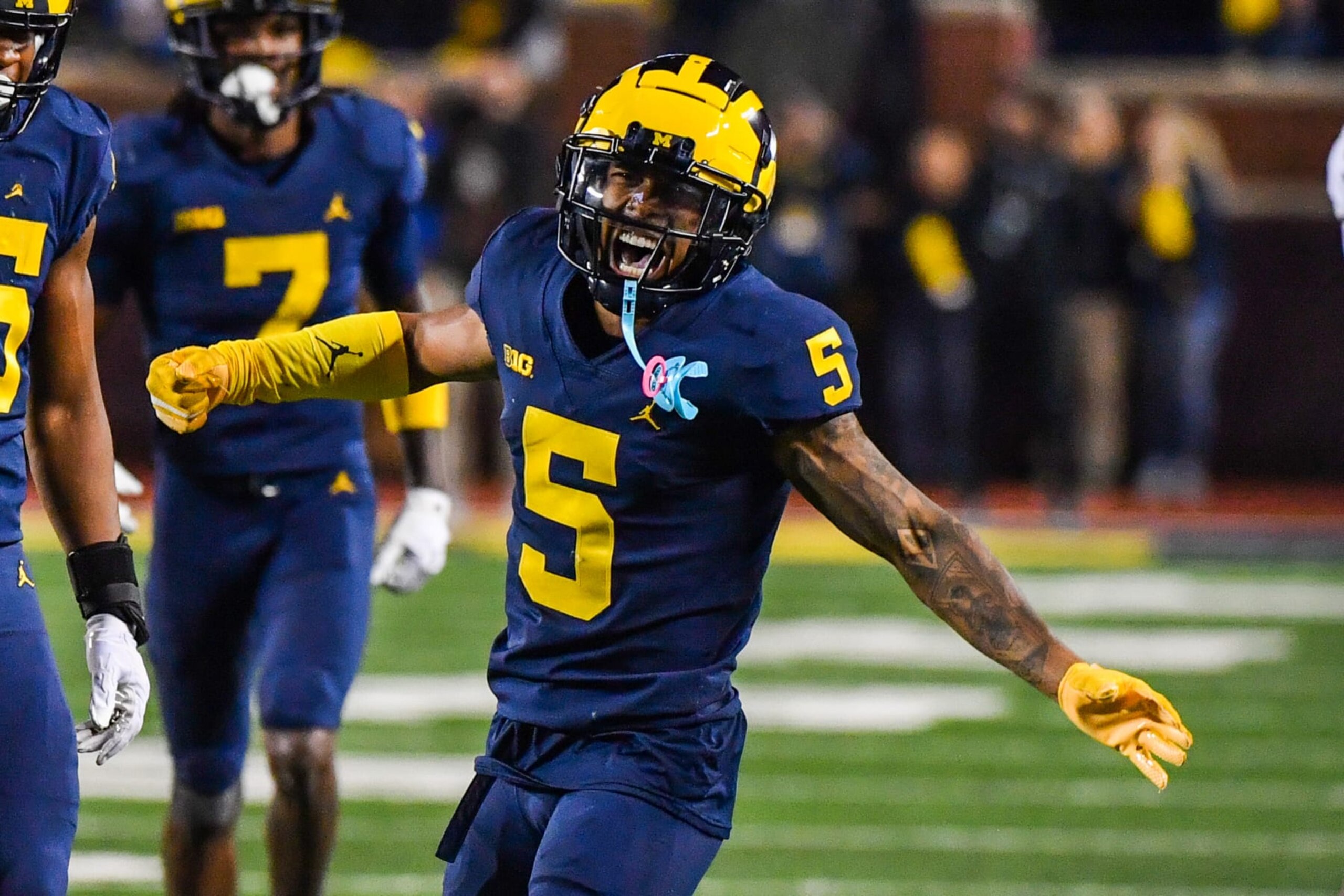 ANN ARBOR, MICHIGAN - OCTOBER 29: D.J. Turner #5 of the Michigan Wolverines reacts after making a play during the second half of a college football game against the Michigan State Spartans at Michigan Stadium on October 29, 2022 in Ann Arbor, Michigan. The Michigan Wolverines won the game 29-7 over the Michigan State Spartans. (Photo by Aaron J. Thornton/Getty Images) ANN ARBOR, MICHIGAN - OCTOBER 29: D.J. Turner #5 of the Michigan Wolverines reacts after making a play during the second half of a college football game against the Michigan State Spartans at Michigan Stadium on October 29, 2022 in Ann Arbor, Michigan. The Michigan Wolverines won the game 29-7 over the Michigan State Spartans. (Photo by Aaron J. Thornton/Getty Images)