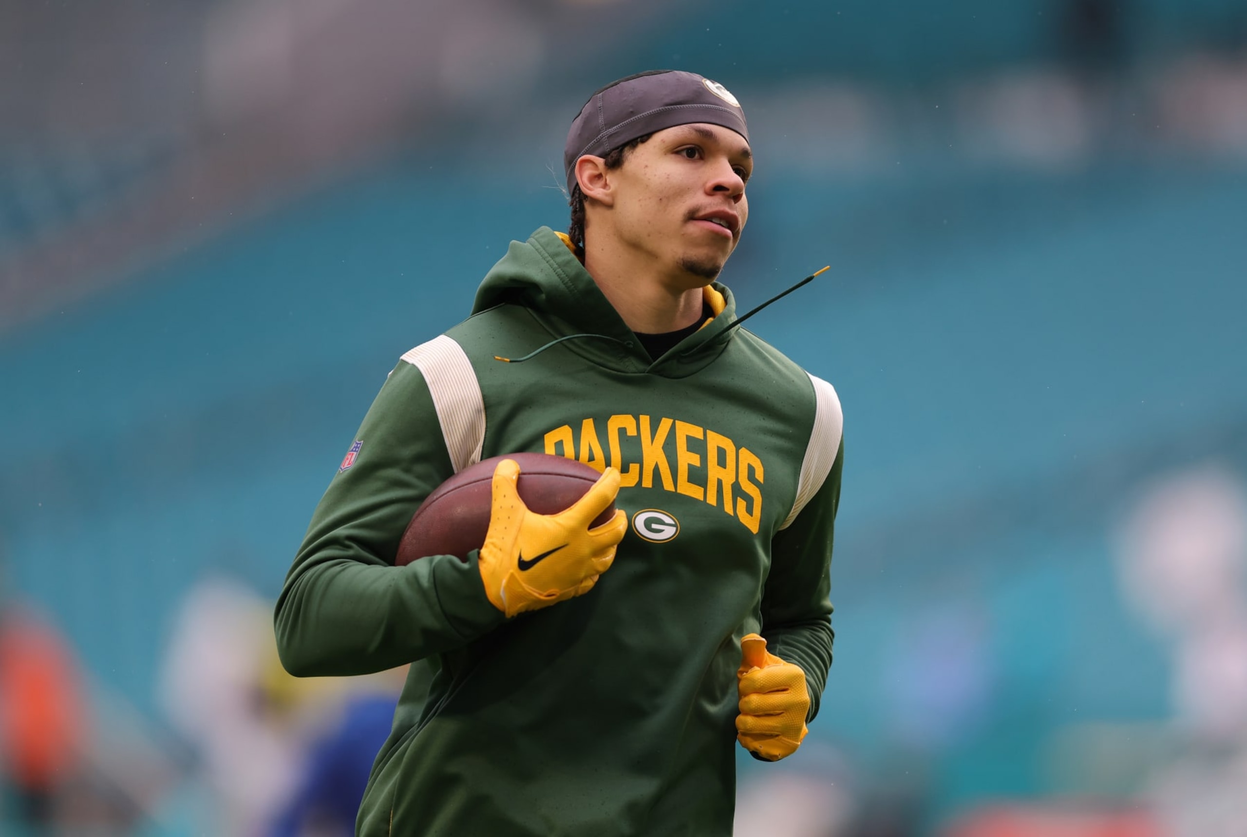 MIAMI GARDENS, FLORIDA - DECEMBER 25: Christian Watson #9 of the Green Bay Packers warms up before the game against the Miami Dolphins at Hard Rock Stadium on December 25, 2022 in Miami Gardens, Florida. (Photo by Megan Briggs/Getty Images)