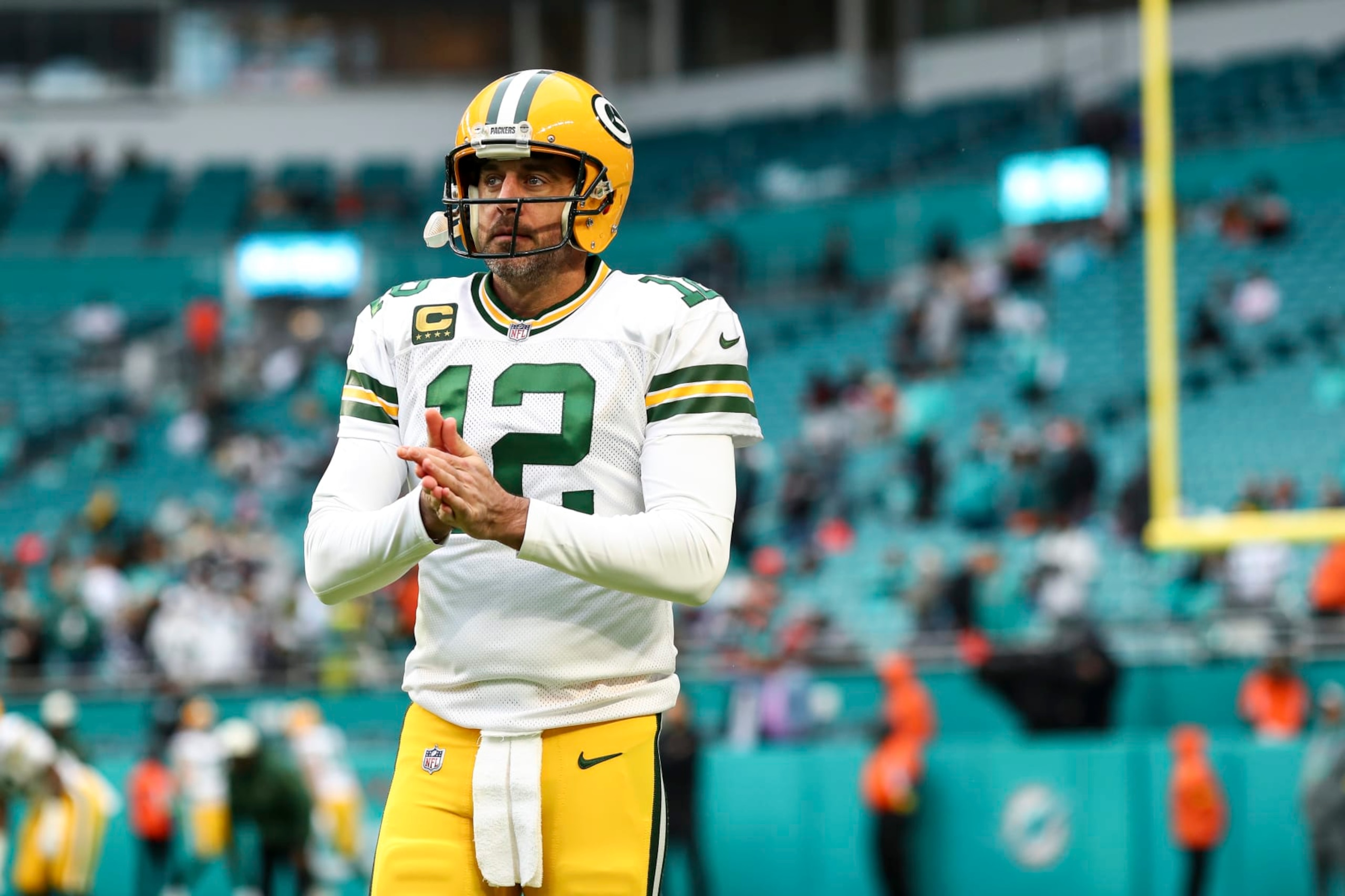 MIAMI GARDENS, FL - DECEMBER 25: Aaron Rodgers #12 of the Green Bay Packers warms up prior to an NFL football game against the Miami Dolphins at Hard Rock Stadium on December 25, 2022 in Miami Gardens, Florida. (Photo by Kevin Sabitus/Getty Images)