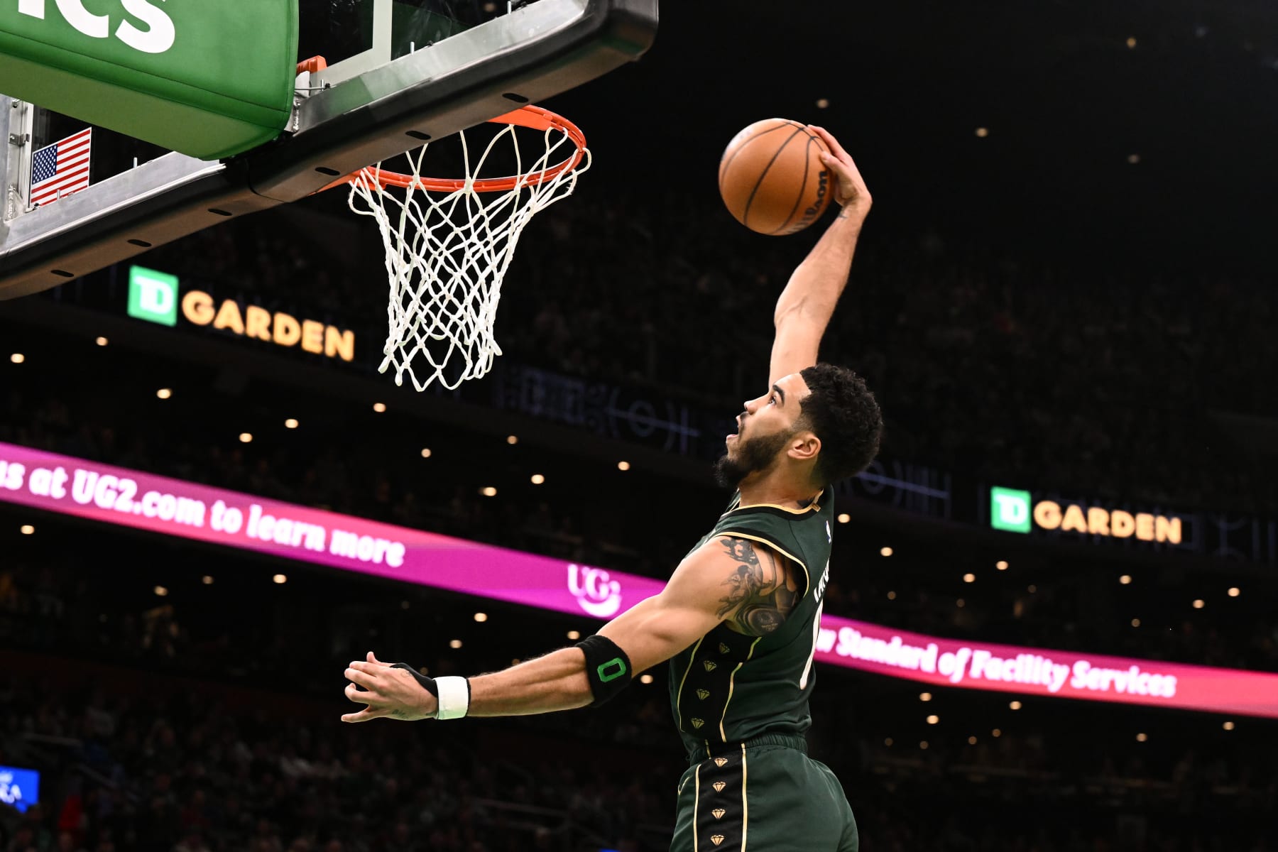 BOSTON, MASSACHUSETTS - DECEMBER 25: Jayson Tatum #0 of the Boston Celtics attempts a dunk against the Milwaukee Bucks during the second quarter at the TD Garden on December 25, 2022 in Boston, Massachusetts. NOTE TO USER: User expressly acknowledges and agrees that, by downloading and or using this photograph, User is consenting to the terms and conditions of the Getty Images License Agreement. (Photo by Brian Fluharty/Getty Images)
