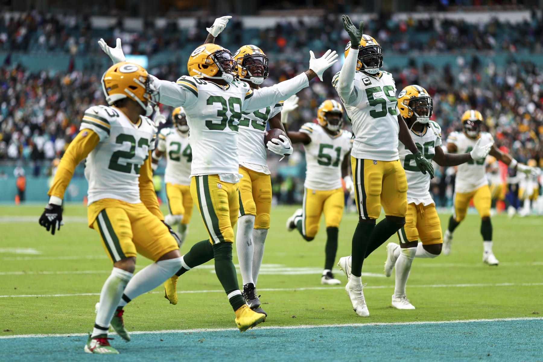 MIAMI GARDENS, FL - DECEMBER 25: Rasul Douglas #29 of the Green Bay Packers celebrates with teammates after intercepting a pass during the fourth quarter of an NFL football game against the Miami Dolphins at Hard Rock Stadium on December 25, 2022 in Miami Gardens, Florida. (Photo by Kevin Sabitus/Getty Images)