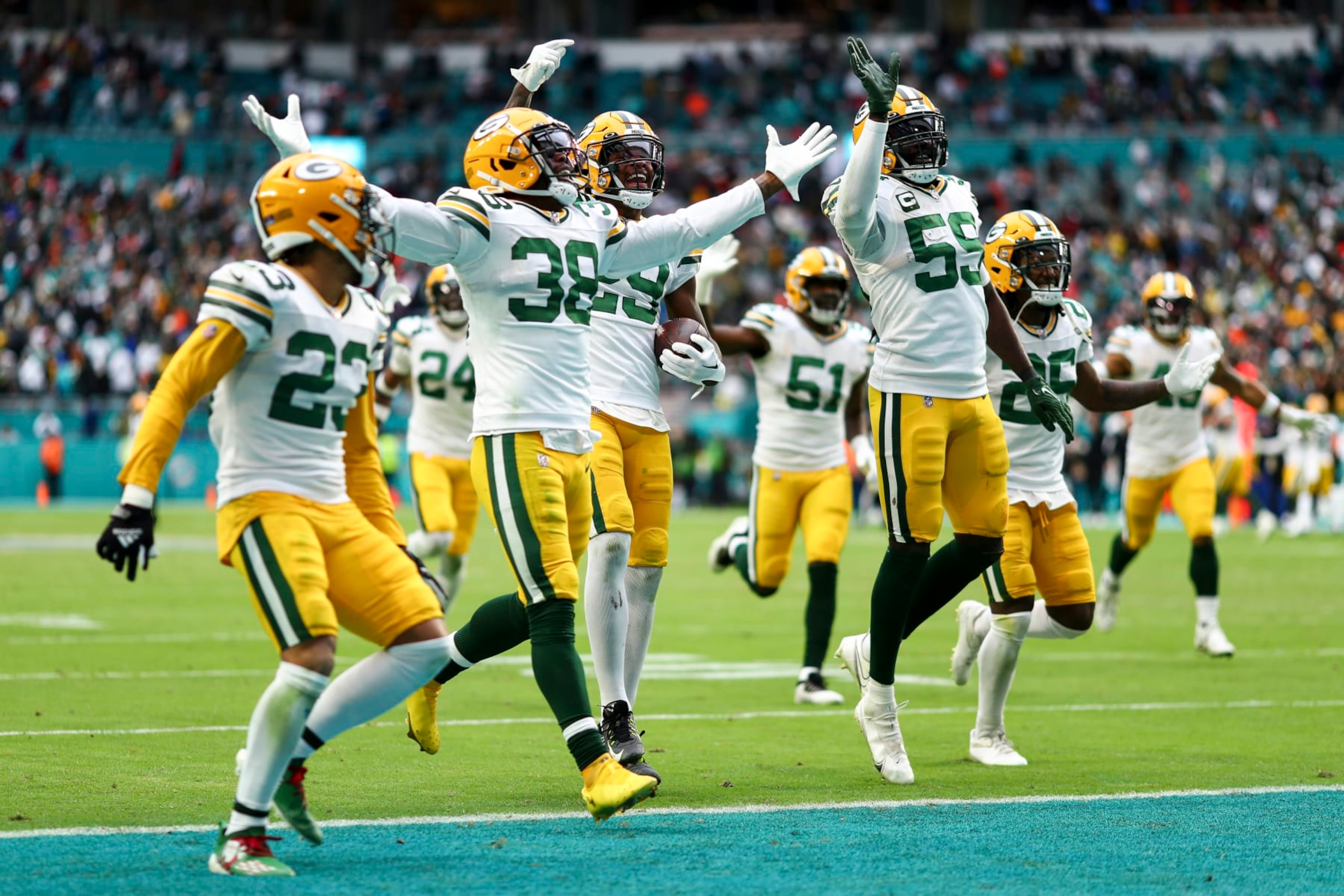 MIAMI GARDENS, FL - DECEMBER 25: Rasul Douglas #29 of the Green Bay Packers celebrates with teammates after intercepting a pass during the fourth quarter of an NFL football game against the Miami Dolphins at Hard Rock Stadium on December 25, 2022 in Miami Gardens, Florida. (Photo by Kevin Sabitus/Getty Images)