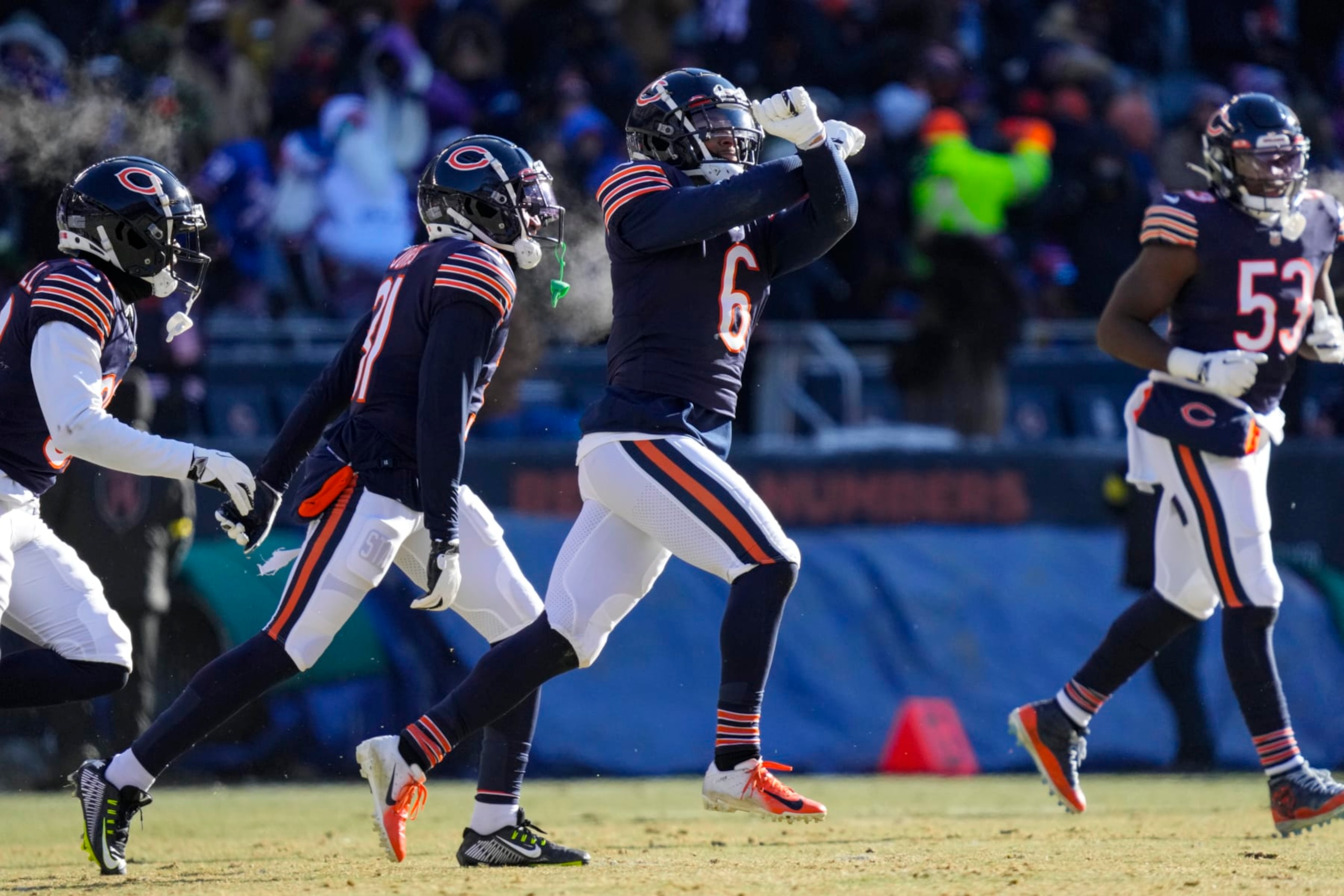 Chicago Bears cornerback Kyler Gordon (6) celebrates after an interception against the Buffalo Bills in the first half of an NFL football game in Chicago, Saturday, Dec. 24, 2022. (AP Photo/Nam Y. Huh)