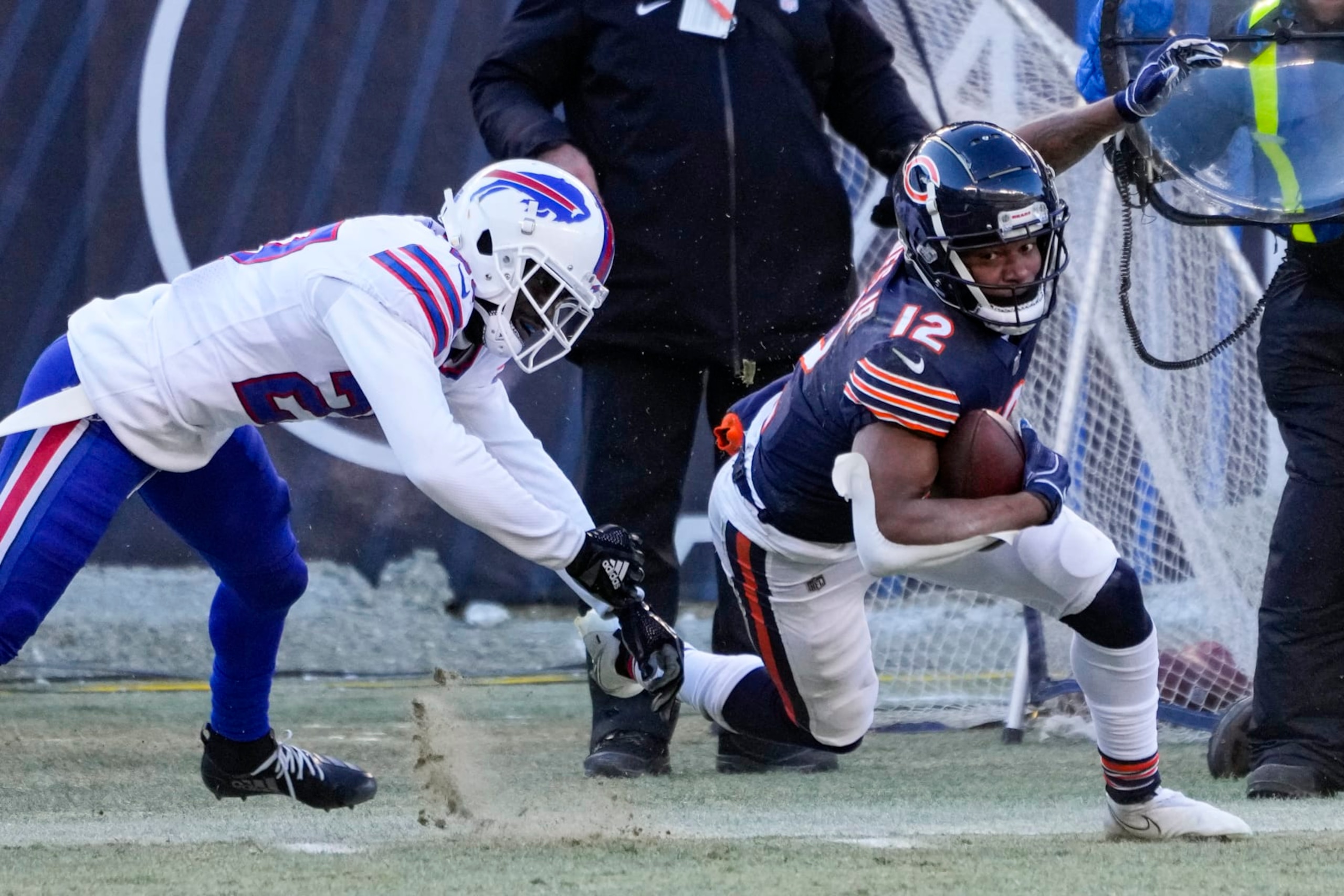 Chicago Bears wide receiver Velus Jones Jr. (12) makes catch for 44 yards in front of Buffalo Bills cornerback Tre'Davious White (27) in the second half of an NFL football game in Chicago, Saturday, Dec. 24, 2022. (AP Photo/Charles Rex Arbogast)