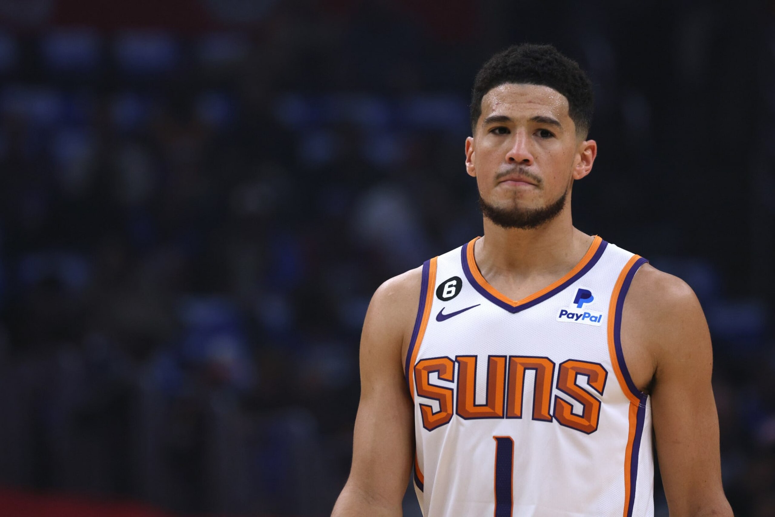 LOS ANGELES, CALIFORNIA - DECEMBER 15: Devin Booker #1 of the Phoenix Suns during a 111-95 Suns win over the LA Clippers at Crypto.com Arena on December 15, 2022 in Los Angeles, California. (Photo by Harry How/Getty Images) NOTE TO USER: User expressly acknowledges and agrees that, by downloading and/or using this photograph, User is consenting to the terms and conditions of the Getty Images License Agreement. Mandatory Copyright Notice: Copyright 2022 NBAE.