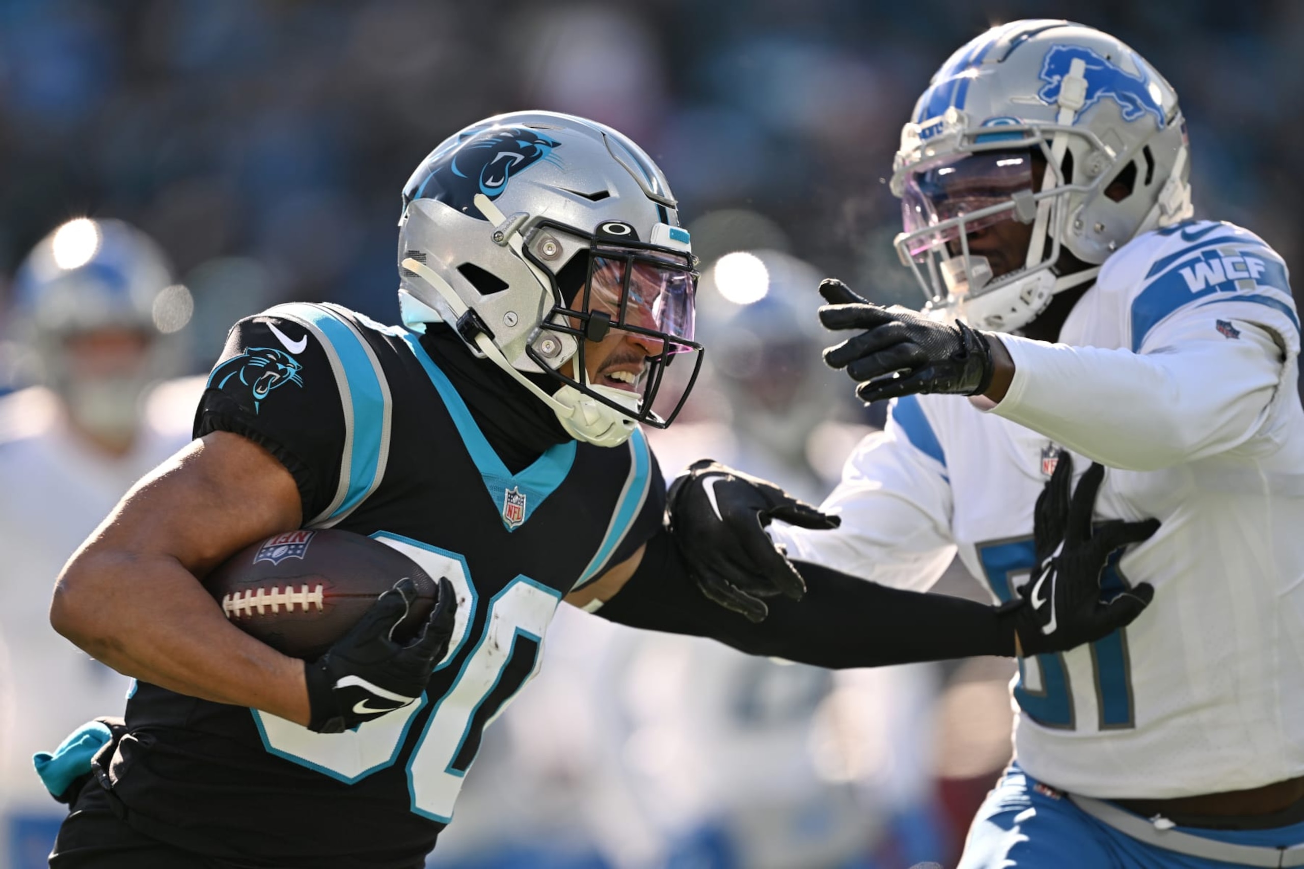 CHARLOTTE, NORTH CAROLINA - DECEMBER 24: Chuba Hubbard #30 of the Carolina Panthers carries the ball during the first quarter of the game against the Detroit Lions at Bank of America Stadium on December 24, 2022 in Charlotte, North Carolina. (Photo by Grant Halverson/Getty Images)