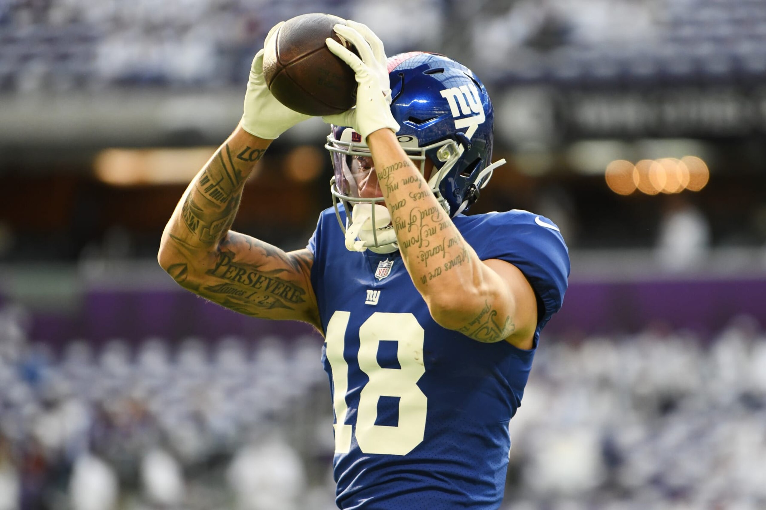 MINNEAPOLIS, MINNESOTA - DECEMBER 24: Isaiah Hodgins #18 of the New York Giants warms up against the New York Giants at U.S. Bank Stadium on December 24, 2022 in Minneapolis, Minnesota. (Photo by Stephen Maturen/Getty Images)