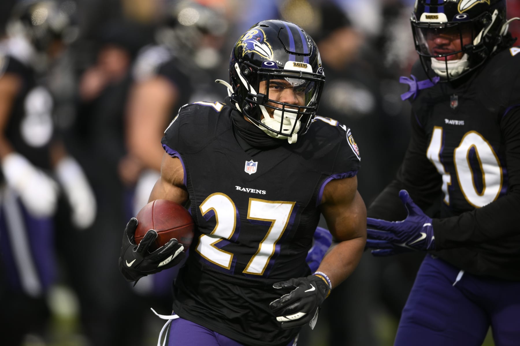 Baltimore Ravens running back J.K. Dobbins (27) warms up before of an NFL football game against the Atlanta Falcons, Saturday, Dec. 24, 2022, in Baltimore. (AP Photo/Nick Wass) Baltimore Ravens running back J.K. Dobbins (27) warms up before of an NFL football game against the Atlanta Falcons, Saturday, Dec. 24, 2022, in Baltimore. (AP Photo/Nick Wass)