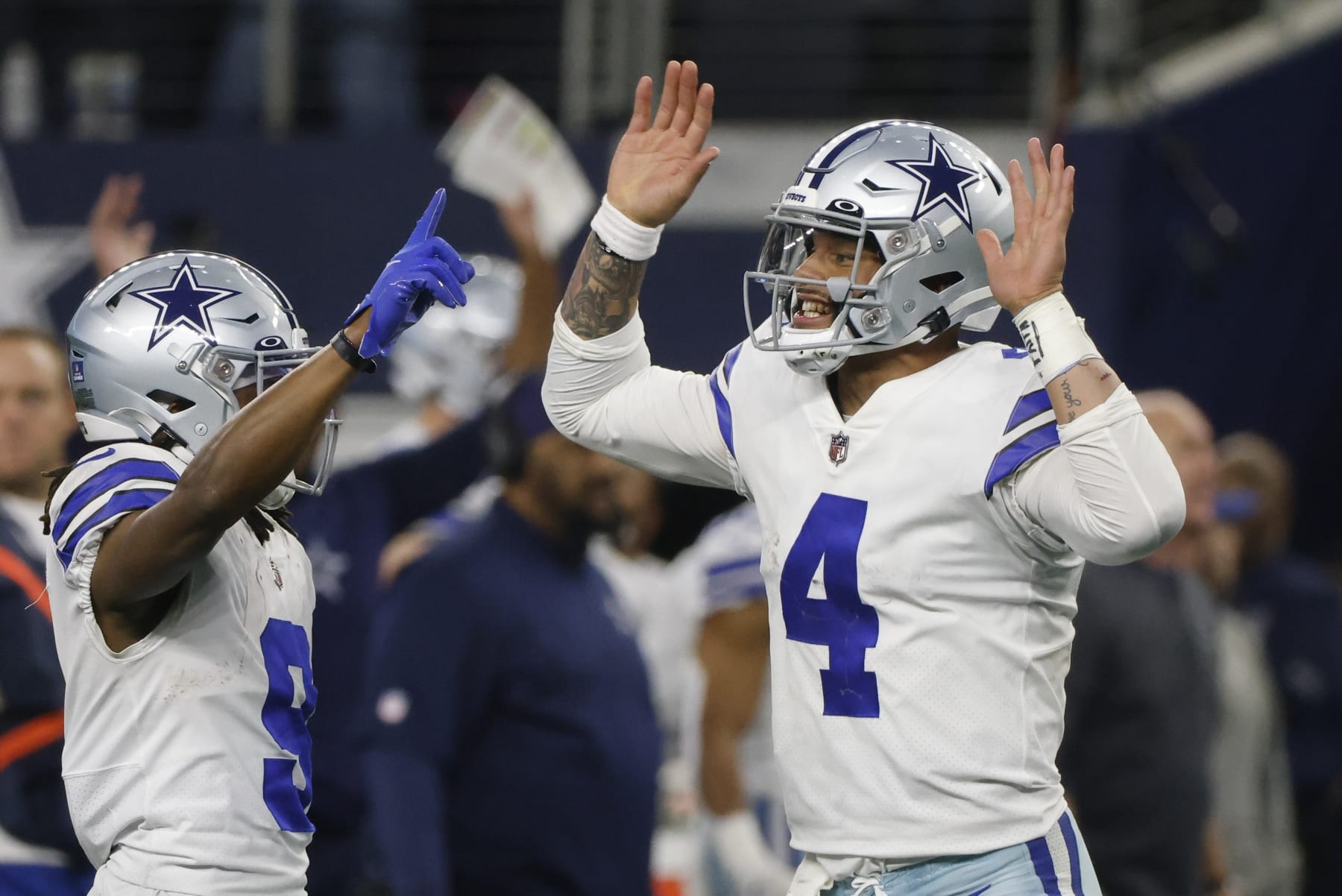 Dallas Cowboys' Dak Prescott celebrates a touchdown during the second half of an NFL football game against the Philadelphia Eagles Saturday, Dec. 24, 2022, in Arlington, Texas. (AP Photo/Michael Ainsworth)