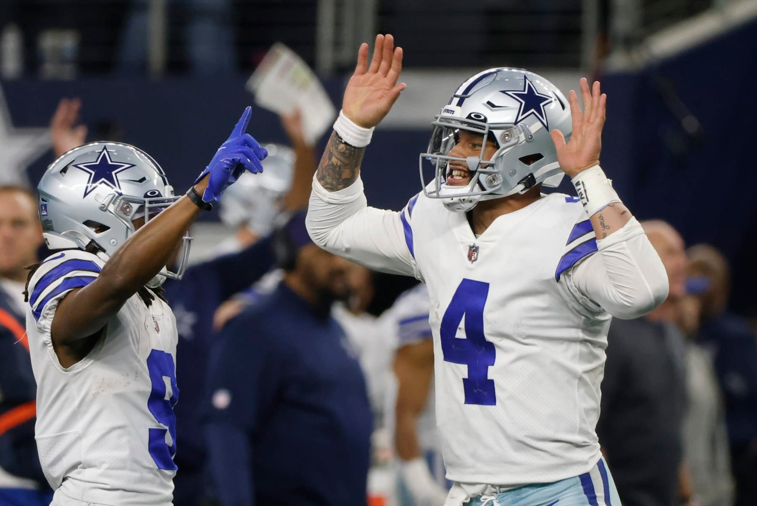 Dallas Cowboys' Dak Prescott celebrates a touchdown during the second half of an NFL football game against the Philadelphia Eagles Saturday, Dec. 24, 2022, in Arlington, Texas. (AP Photo/Michael Ainsworth)