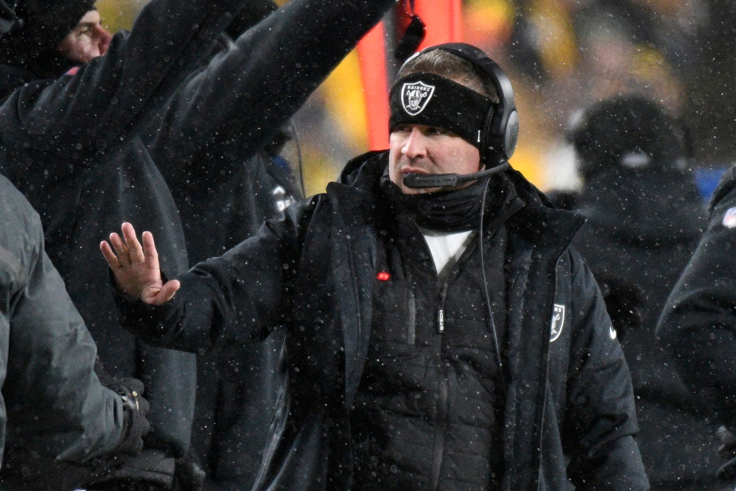 Las Vegas Raiders head coach Josh McDaniels gestures on the sidelines during the first half of an NFL football game against the Pittsburgh Steelers in Pittsburgh, Saturday, Dec. 24, 2022. (AP Photo/Don Wright)