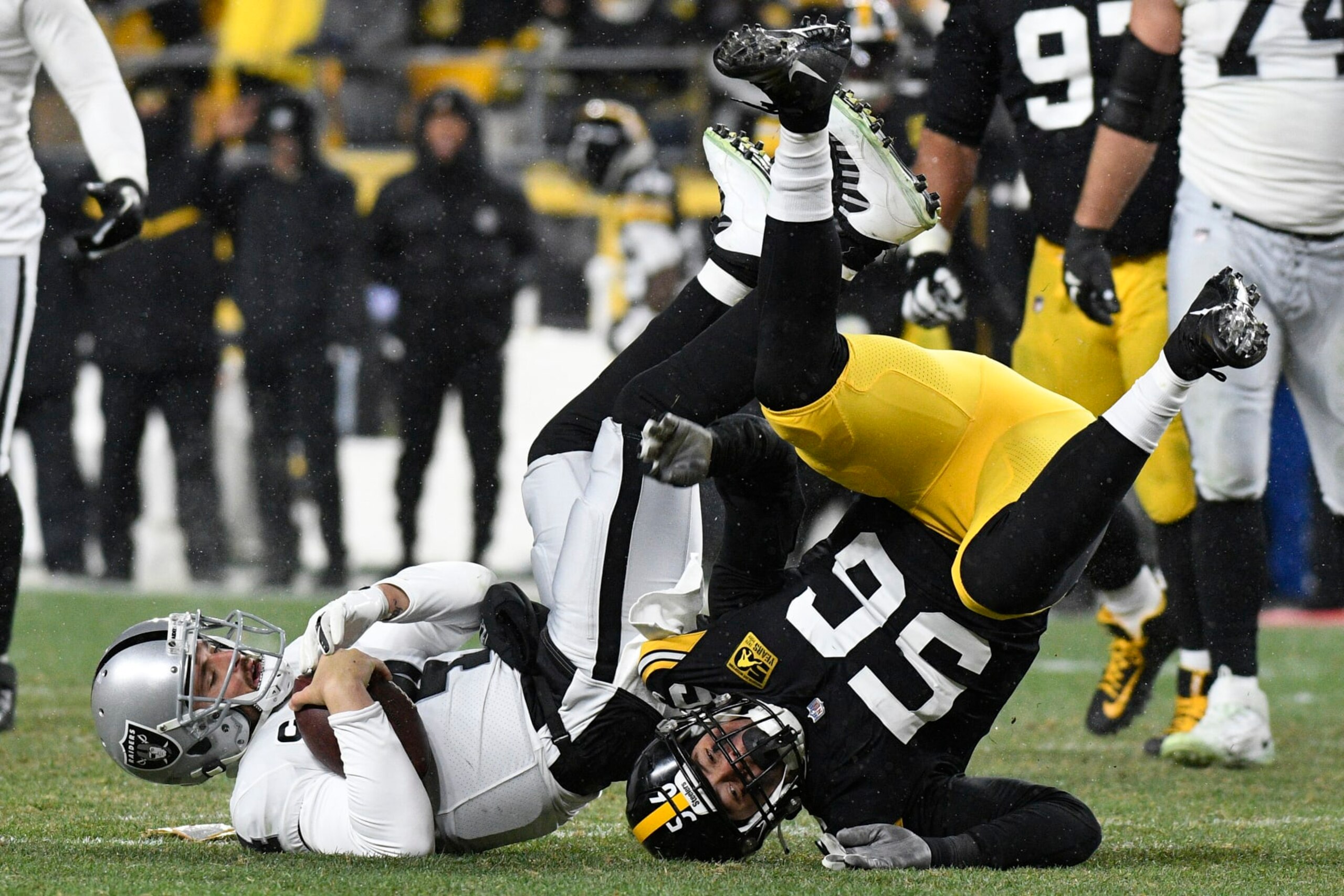 Pittsburgh Steelers linebacker Alex Highsmith (56) sacks Las Vegas Raiders quarterback Derek Carr (4) during the second half of an NFL football game in Pittsburgh, Saturday, Dec. 24, 2022. (AP Photo/Don Wright)