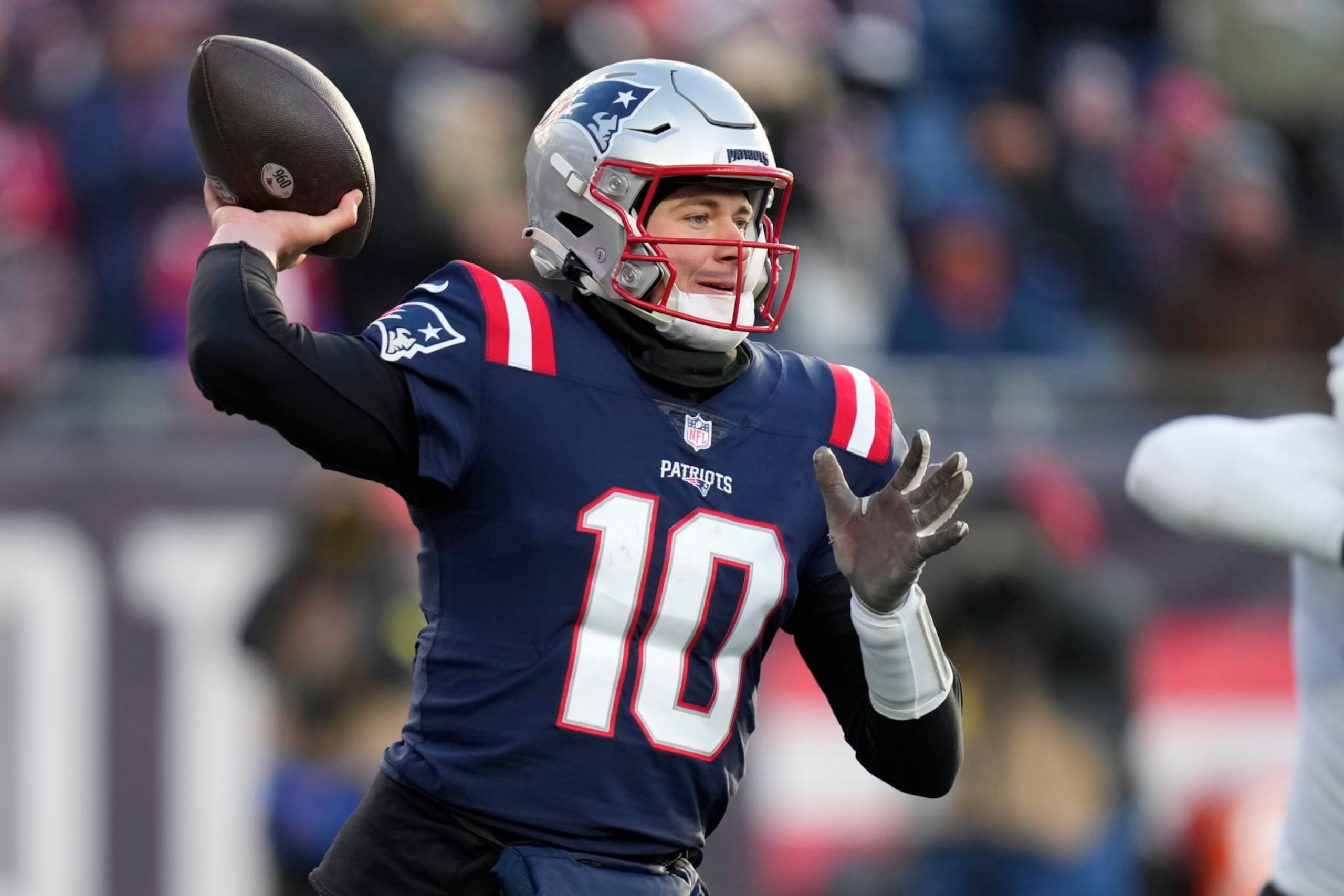 New England Patriots quarterback Mac Jones (10) throws a pass during the second half of an NFL football game, Saturday, Dec. 24, 2022, in Foxborough, Mass. (AP Photo/Charles Krupa)