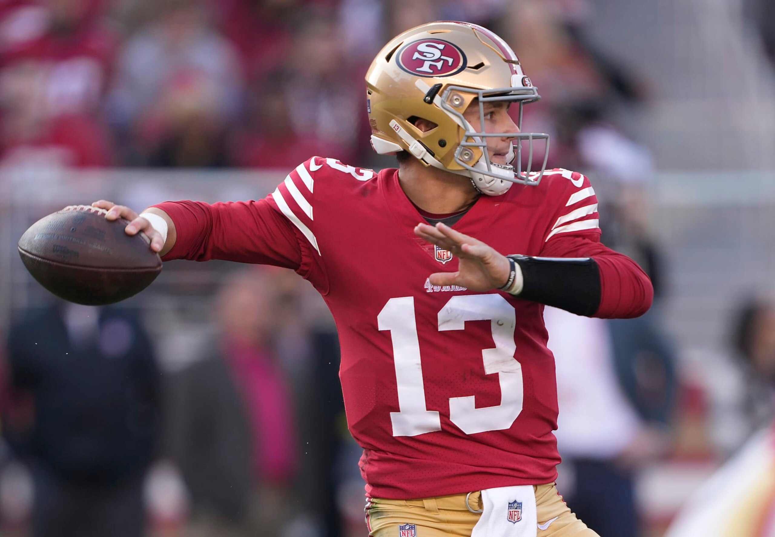 SANTA CLARA, CALIFORNIA - DECEMBER 24: Brock Purdy #13 of the San Francisco 49ers throws a pass against the Washington Commanders during the first half of the game at Levi's Stadium on December 24, 2022 in Santa Clara, California. (Photo by Thearon W. Henderson/Getty Images)