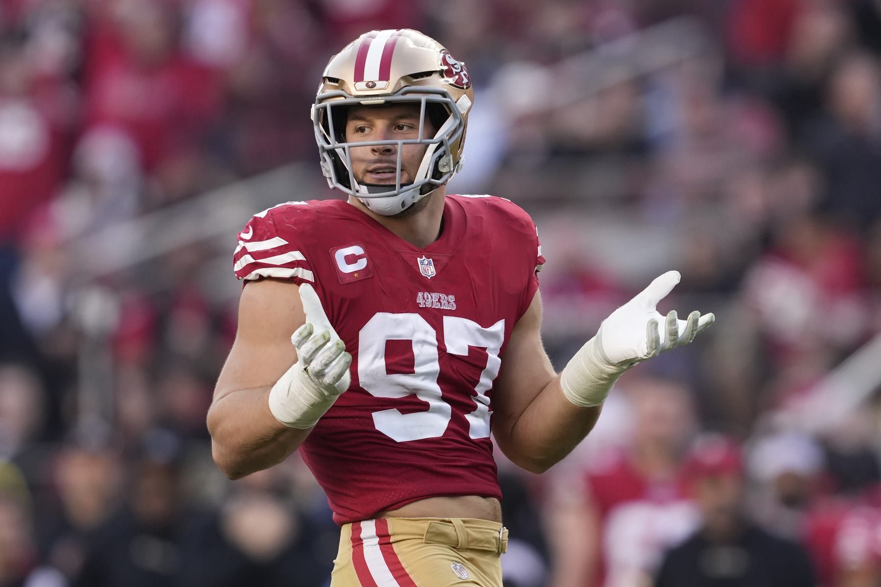 SANTA CLARA, CALIFORNIA - DECEMBER 24: Nick Bosa #97 of the San Francisco 49ers reacts after forcing a fumble during the fourth quarter in the game against the Washington Commanders at Levi's Stadium on December 24, 2022 in Santa Clara, California. (Photo by Thearon W. Henderson/Getty Images)