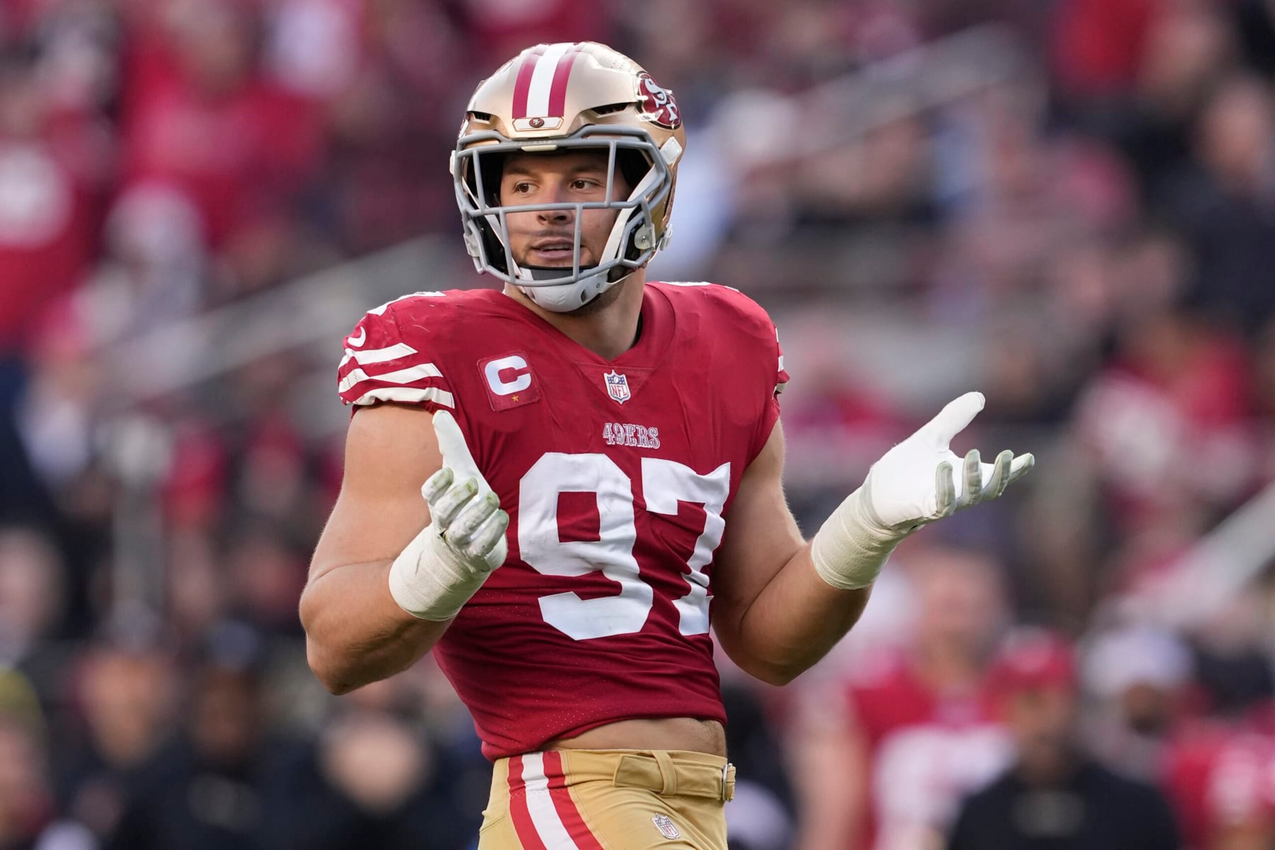 SANTA CLARA, CALIFORNIA - DECEMBER 24: Nick Bosa #97 of the San Francisco 49ers reacts after forcing a fumble during the fourth quarter in the game against the Washington Commanders at Levi's Stadium on December 24, 2022 in Santa Clara, California. (Photo by Thearon W. Henderson/Getty Images)