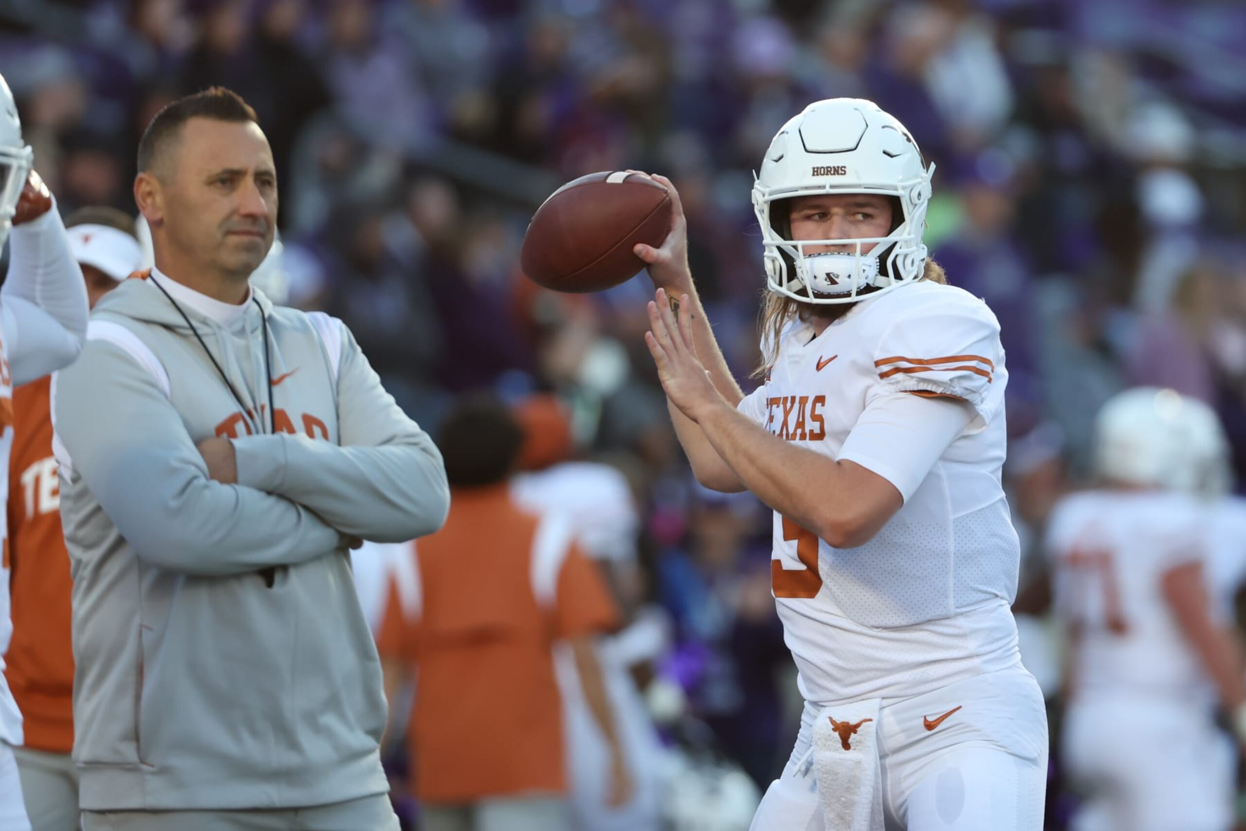 Steve Sarkisian and Quinn Ewers