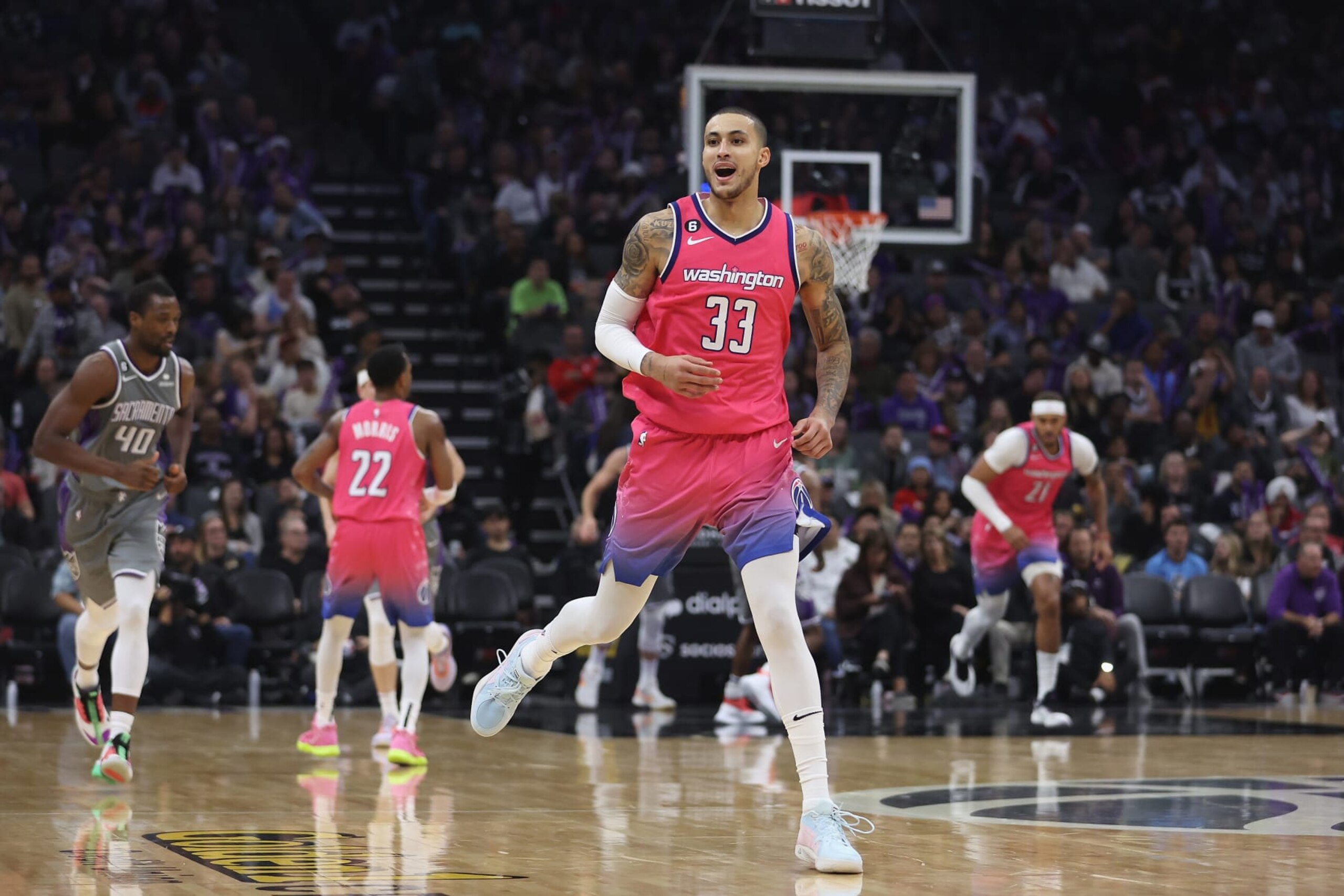 SACRAMENTO, CALIFORNIA - DECEMBER 23: Kyle Kuzma #33 of the Washington Wizards reacts after a basket in the third quarter against the Sacramento Kings at Golden 1 Center on December 23, 2022 in Sacramento, California. NOTE TO USER: User expressly acknowledges and agrees that, by downloading and/or using this photograph, User is consenting to the terms and conditions of the Getty Images License Agreement. (Photo by Lachlan Cunningham/Getty Images) SACRAMENTO, CALIFORNIA - DECEMBER 23: Kyle Kuzma #33 of the Washington Wizards reacts after a basket in the third quarter against the Sacramento Kings at Golden 1 Center on December 23, 2022 in Sacramento, California. NOTE TO USER: User expressly acknowledges and agrees that, by downloading and/or using this photograph, User is consenting to the terms and conditions of the Getty Images License Agreement. (Photo by Lachlan Cunningham/Getty Images)
