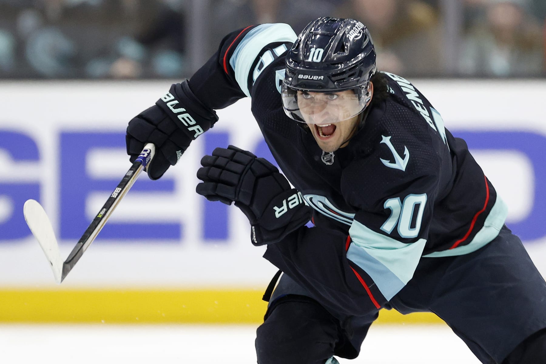 SEATTLE, WASHINGTON - DECEMBER 20: Matty Beniers #10 of the Seattle Kraken skates against the St. Louis Blues during the first period at Climate Pledge Arena on December 20, 2022 in Seattle, Washington. (Photo by Steph Chambers/Getty Images)