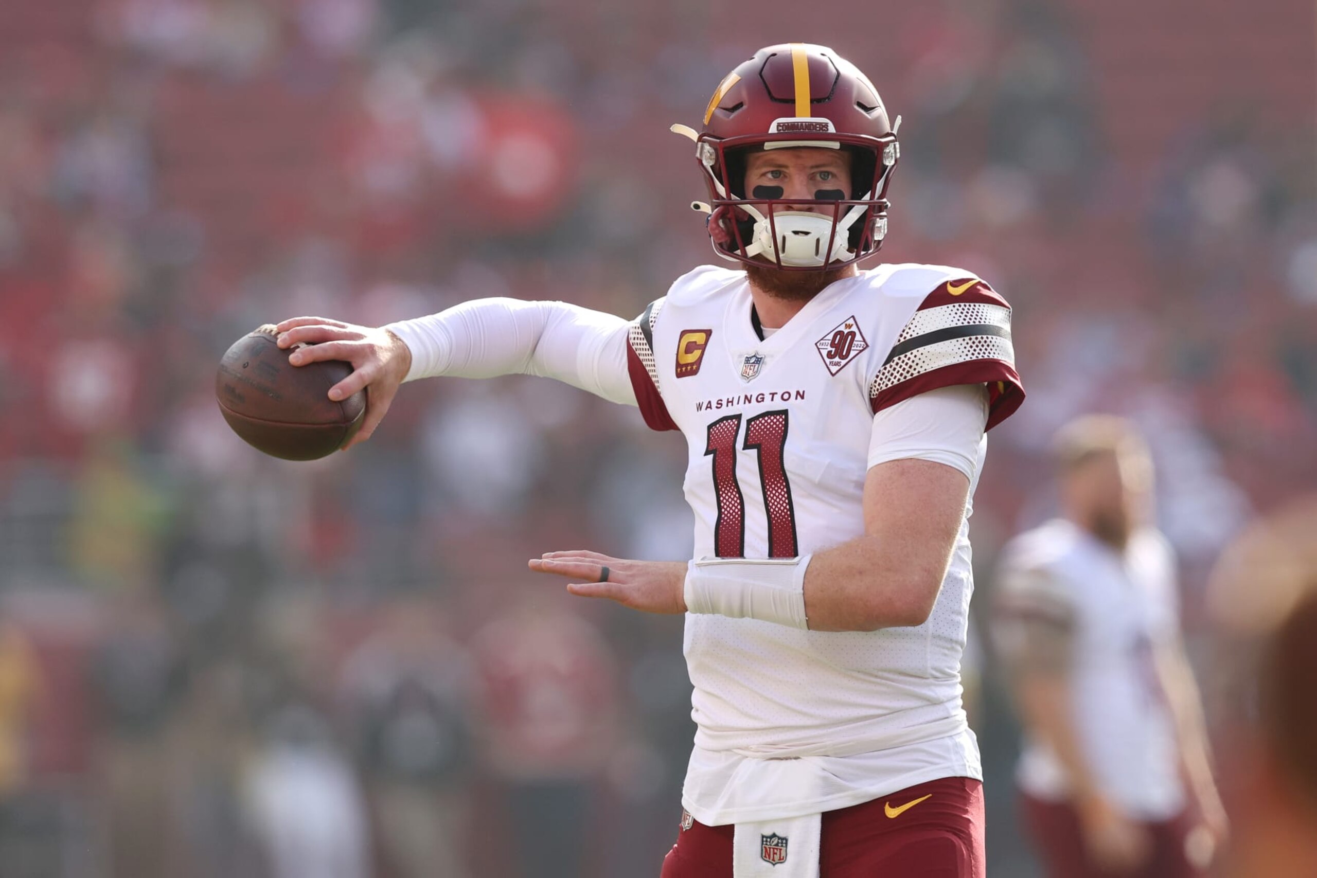 SANTA CLARA, CALIFORNIA - DECEMBER 24: Carson Wentz #11 of the Washington Commanders warms up prior to a game against the San Francisco 49ers at Levi's Stadium on December 24, 2022 in Santa Clara, California. (Photo by Lachlan Cunningham/Getty Images)