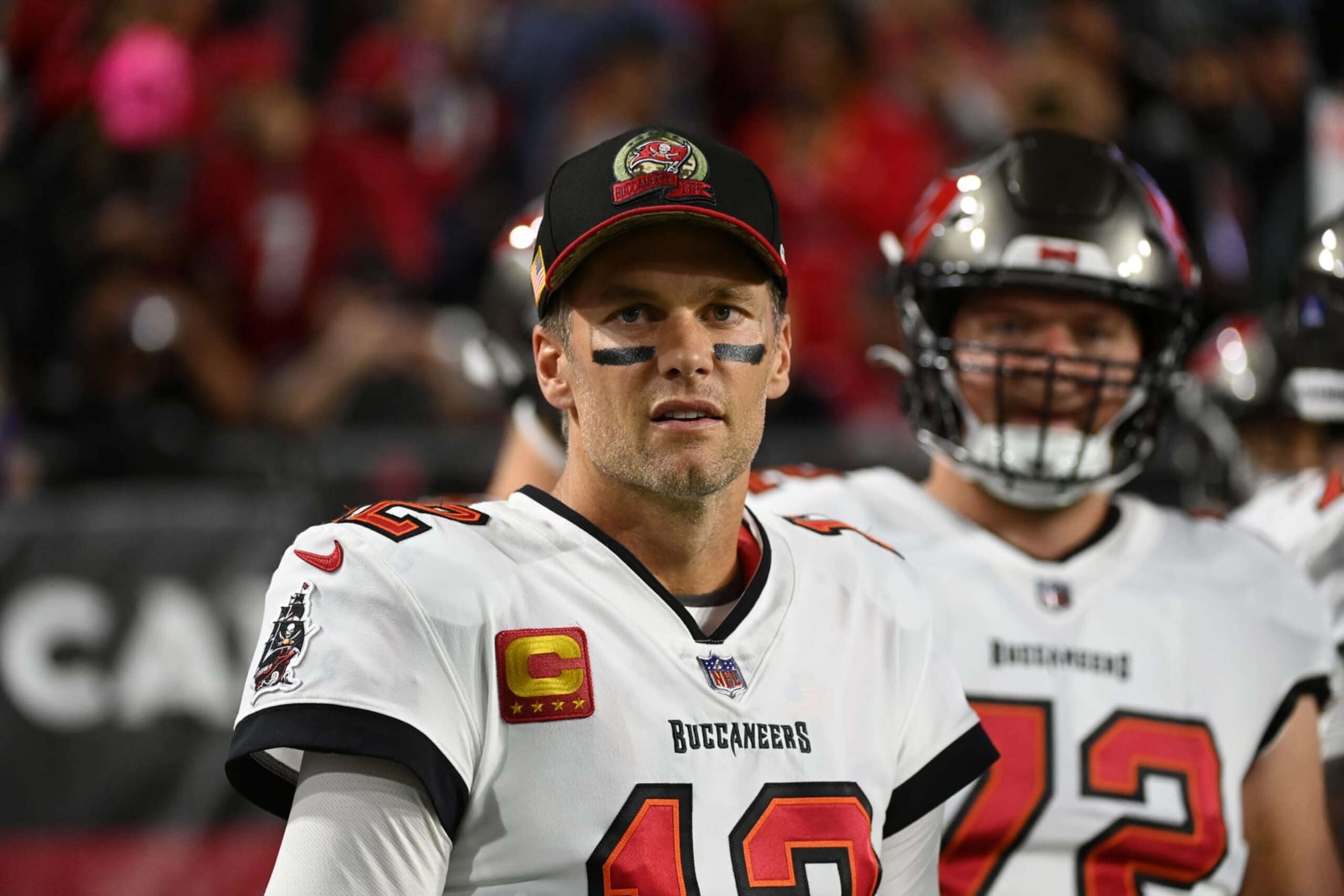 GLENDALE, ARIZONA - DECEMBER 25: Tom Brady #12 of the Tampa Bay Buccaneers prepares for a game against the Arizona Cardinals at State Farm Stadium on December 25, 2022 in Glendale, Arizona. (Photo by Norm Hall/Getty Images)