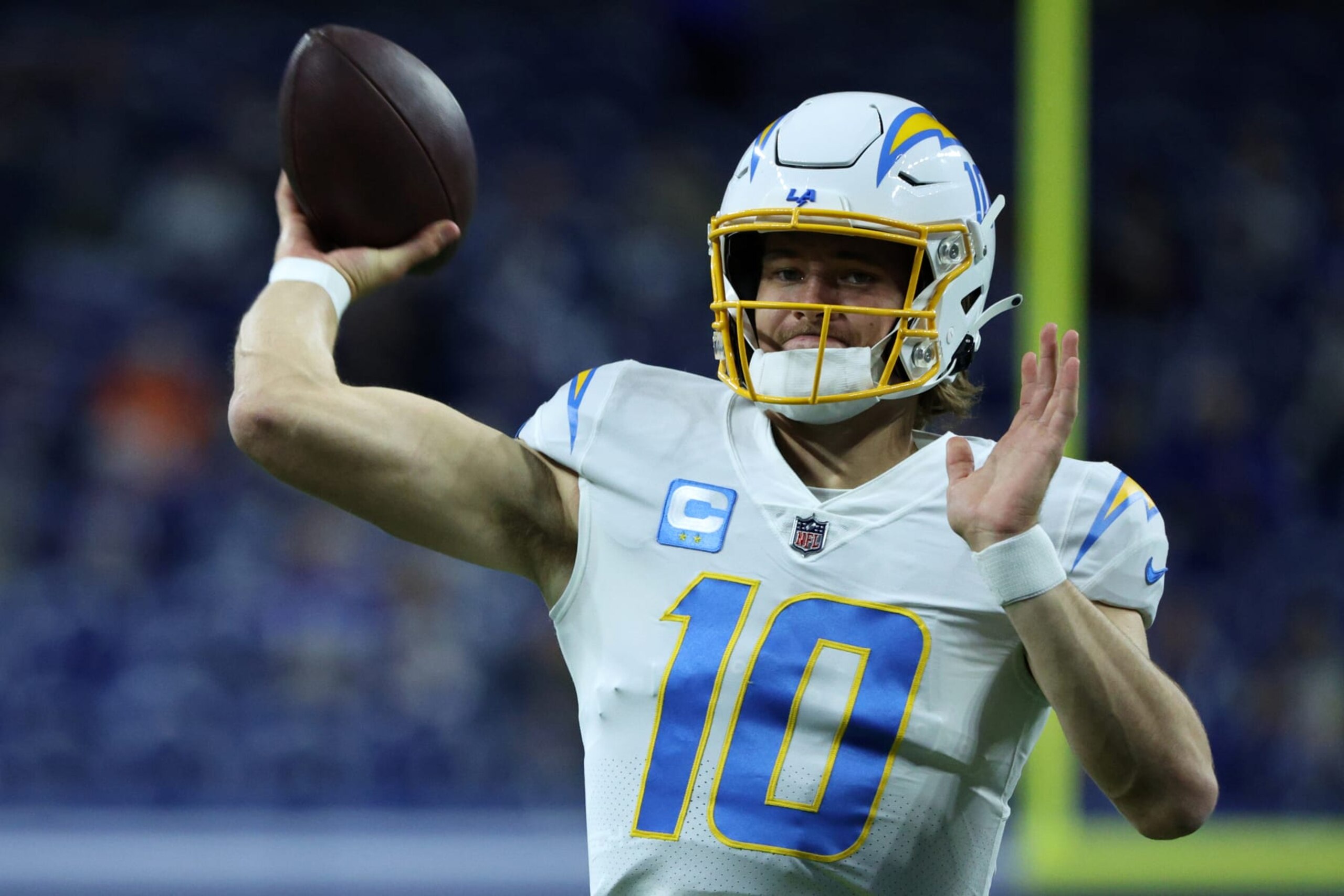 INDIANAPOLIS, INDIANA - DECEMBER 26: Justin Herbert #10 of the Los Angeles Chargers warms up prior to playing the Indianapolis Colts at Lucas Oil Stadium on December 26, 2022 in Indianapolis, Indiana. (Photo by Michael Hickey/Getty Images)