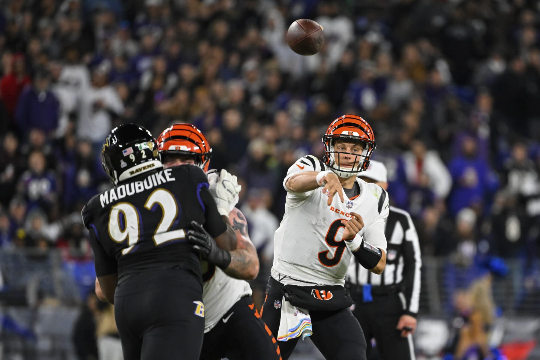 Cincinnati Bengals quarterback Joe Burrow (9) throws the ball during the second half of a NFL football game against the Baltimore Ravens, Sunday, Oct. 9, 2022, in Baltimore. (AP Photo/Terrance Williams)