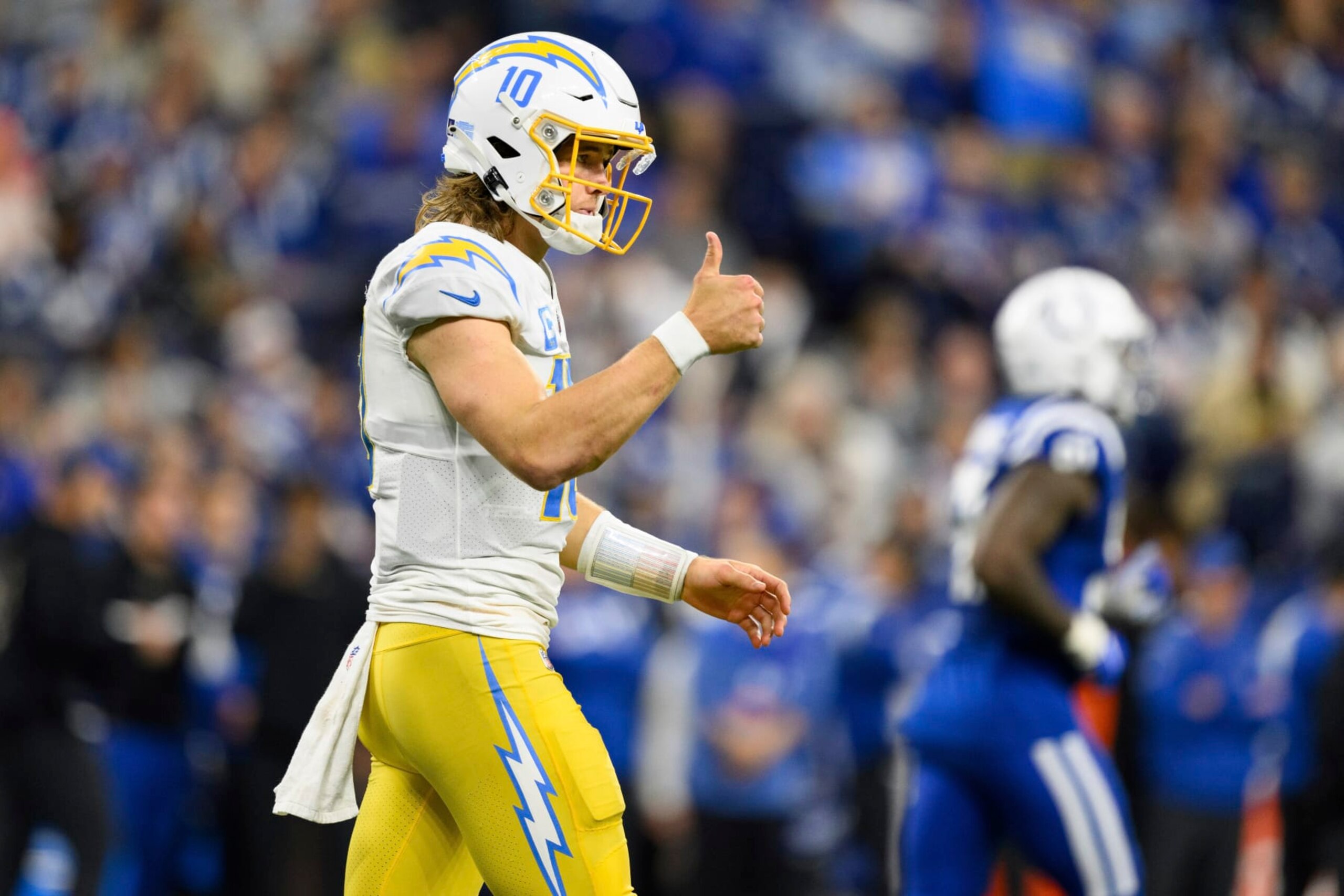 Los Angeles Chargers quarterback Justin Herbert (10) gives the sideline a thumbs up after a first down throw during an NFL football game against the Indianapolis Colts, Monday, Dec. 26, 2022, in Indianapolis. (AP Photo/Zach Bolinger) Los Angeles Chargers quarterback Justin Herbert (10) gives the sideline a thumbs up after a first down throw during an NFL football game against the Indianapolis Colts, Monday, Dec. 26, 2022, in Indianapolis. (AP Photo/Zach Bolinger)