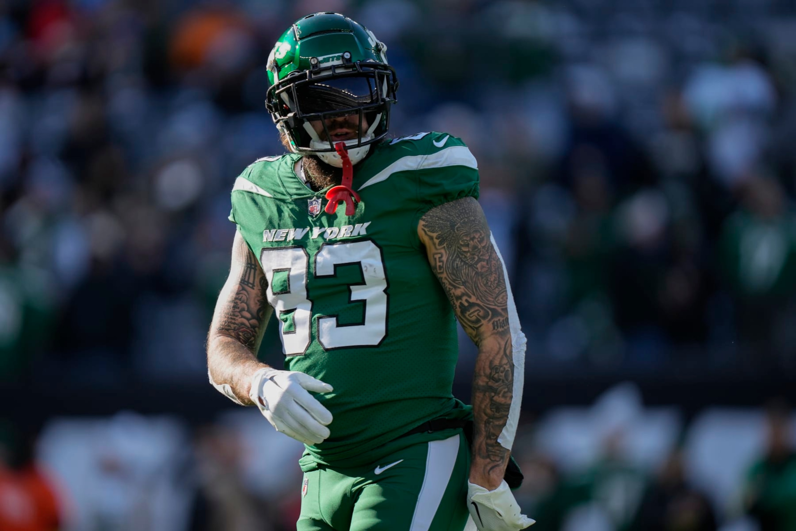 New York Jets tight end Tyler Conklin (83) warms up before playing against the Detroit Lions in an NFL football game, Sunday, Dec. 18, 2022, in East Rutherford, N.J. (AP Photo/Bryan Woolston)