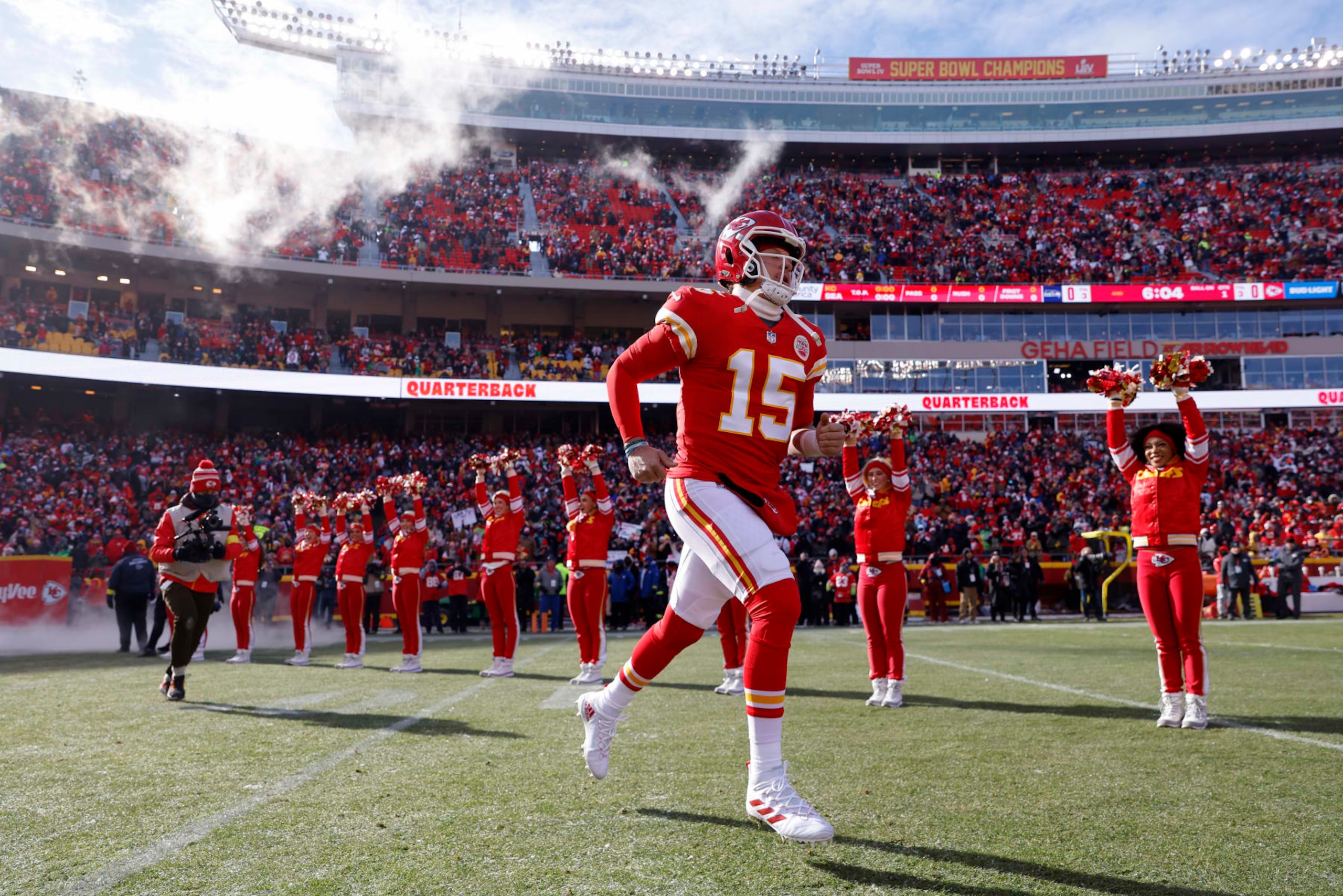 KANSAS CITY, MISSOURI - DECEMBER 24: Patrick Mahomes #15 of the Kansas City Chiefs runs onto the field during pregame against the Seattle Seahawks at Arrowhead Stadium on December 24, 2022 in Kansas City, Missouri. (Photo by David Eulitt/Getty Images)