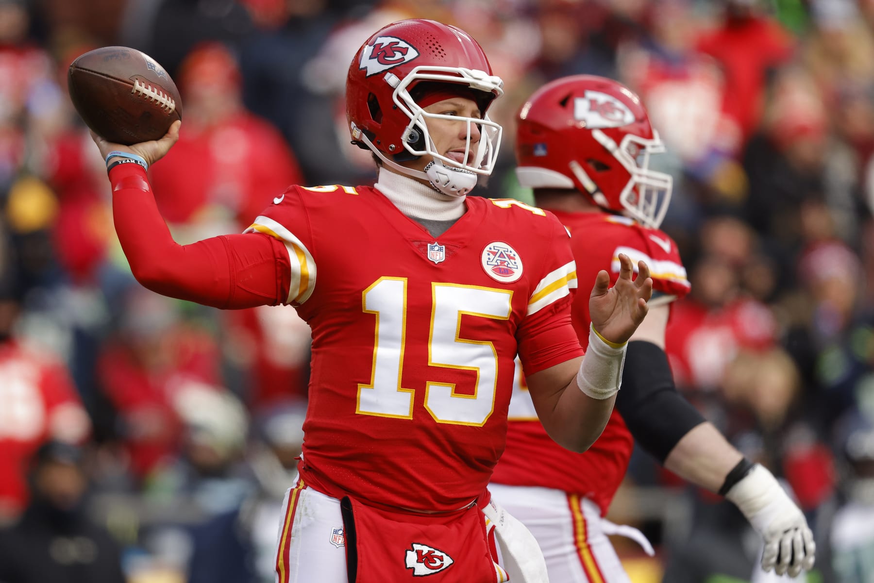 KANSAS CITY, MISSOURI - DECEMBER 24: Patrick Mahomes #15 of the Kansas City Chiefs throws a pass against the Seattle Seahawks during the second half of the game at Arrowhead Stadium on December 24, 2022 in Kansas City, Missouri. (Photo by David Eulitt/Getty Images)