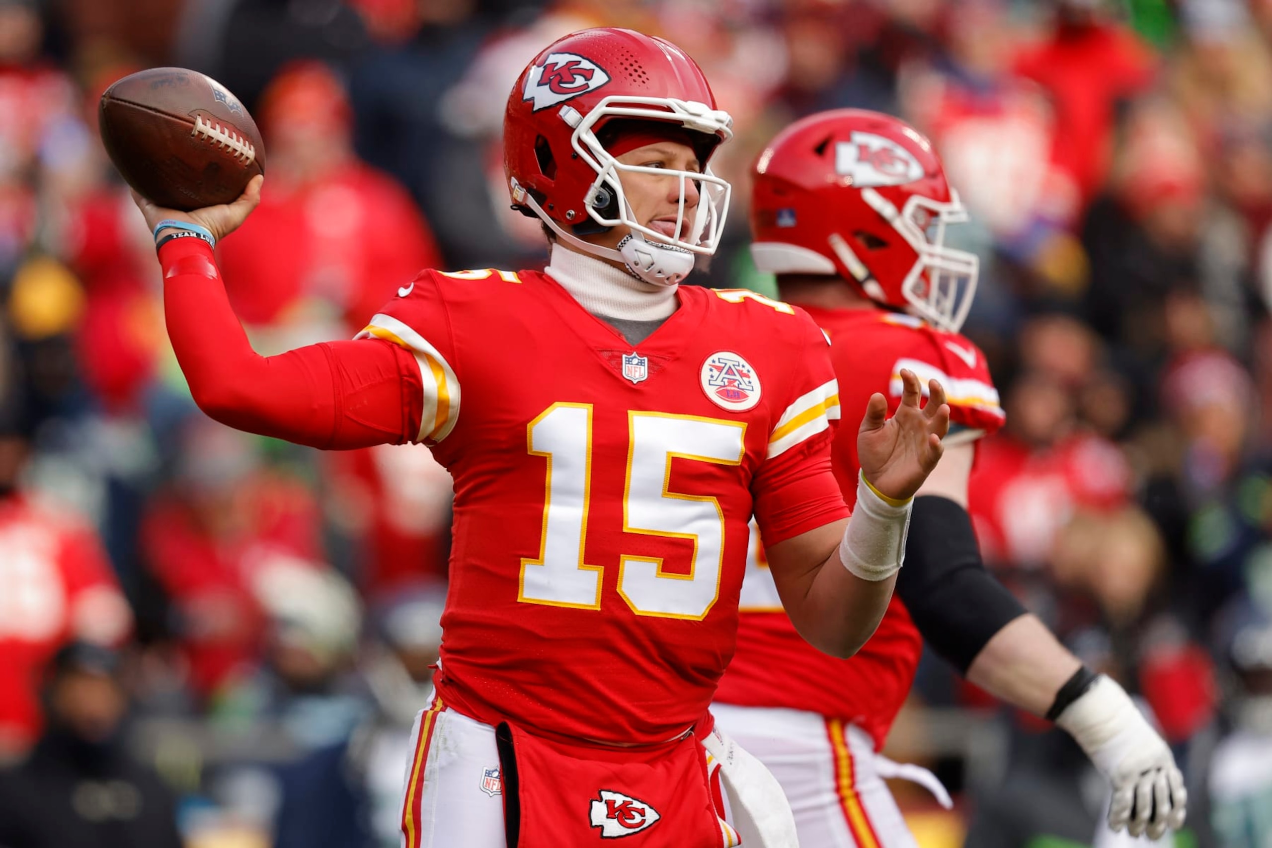 KANSAS CITY, MISSOURI - DECEMBER 24: Patrick Mahomes #15 of the Kansas City Chiefs throws a pass against the Seattle Seahawks during the second half of the game at Arrowhead Stadium on December 24, 2022 in Kansas City, Missouri. (Photo by David Eulitt/Getty Images)