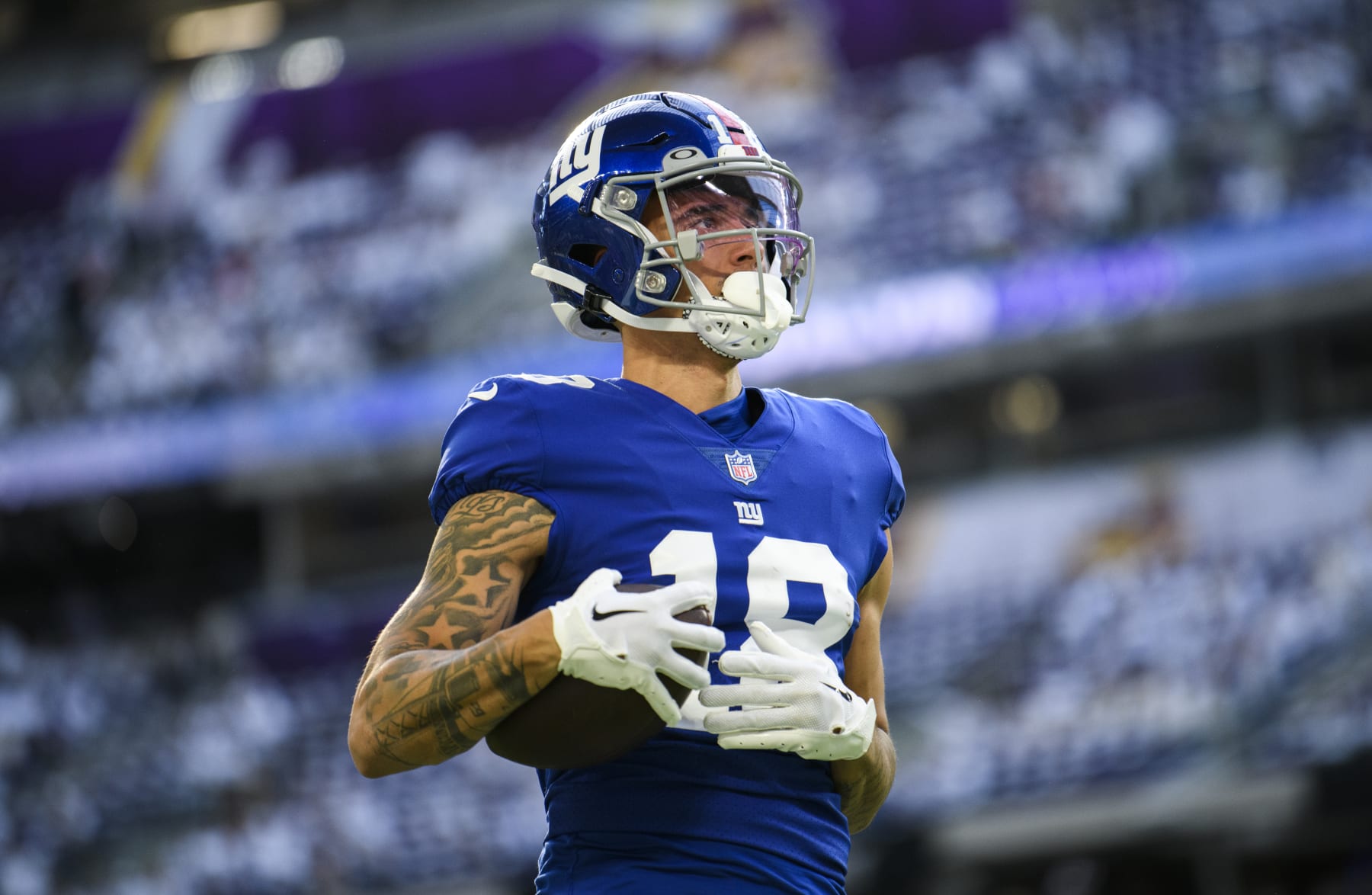 MINNEAPOLIS, MN - DECEMBER 24: Isaiah Hodgins #18 of the New York Giants warms up before the game against the Minnesota Vikings at U.S. Bank Stadium on December 24, 2022 in Minneapolis, Minnesota. (Photo by Stephen Maturen/Getty Images)