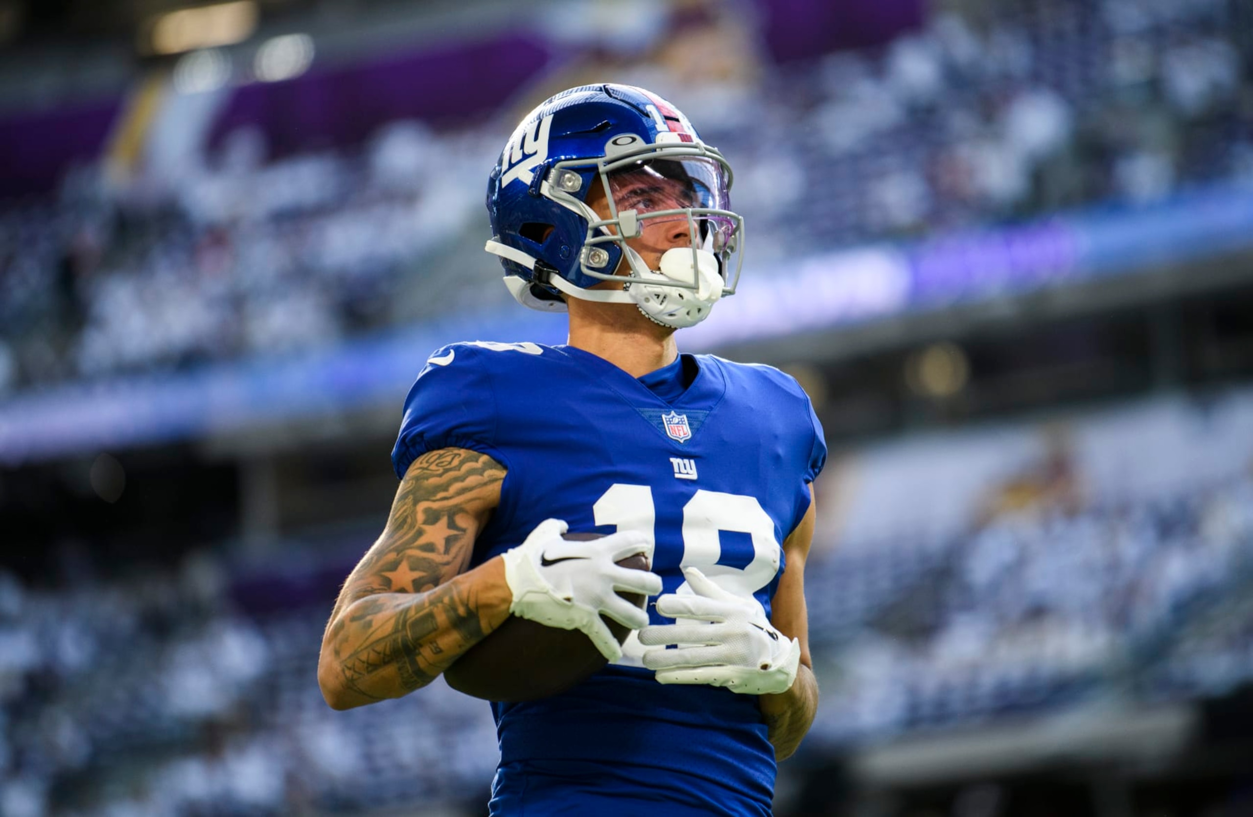 MINNEAPOLIS, MN - DECEMBER 24: Isaiah Hodgins #18 of the New York Giants warms up before the game against the Minnesota Vikings at U.S. Bank Stadium on December 24, 2022 in Minneapolis, Minnesota. (Photo by Stephen Maturen/Getty Images)