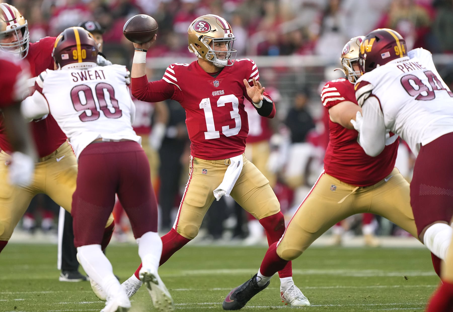 SANTA CLARA, CALIFORNIA - DECEMBER 24: Brock Purdy #13 of the San Francisco 49ers throws a pass against the Washington Commanders during the fourth quarter of an NFL football game at Levi's Stadium on December 24, 2022 in Santa Clara, California. (Photo by Thearon W. Henderson/Getty Images)