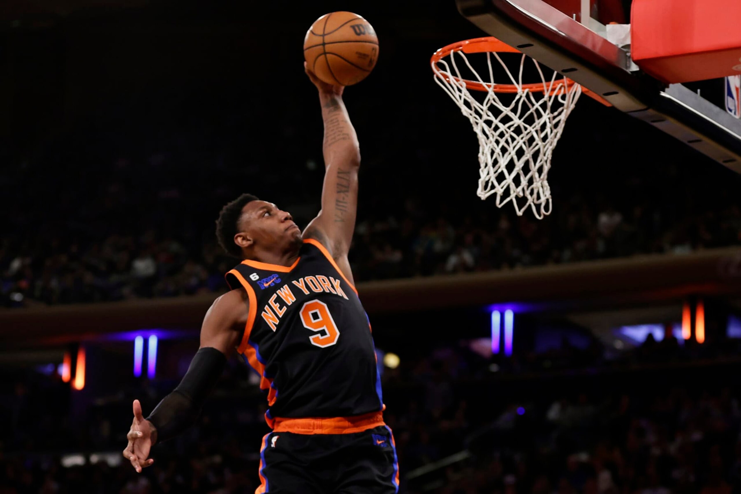 NEW YORK, NEW YORK - DECEMBER 23: RJ Barrett #9 of the New York Knicks dunks the ball against the Chicago Bulls during the first half at Madison Square Garden on December 23, 2022 in New York City. NOTE TO USER: User expressly acknowledges and agrees that, by downloading and or using this Photograph, user is consenting to the terms and conditions of the Getty Images License Agreement.  (Photo by Adam Hunger/Getty Images)