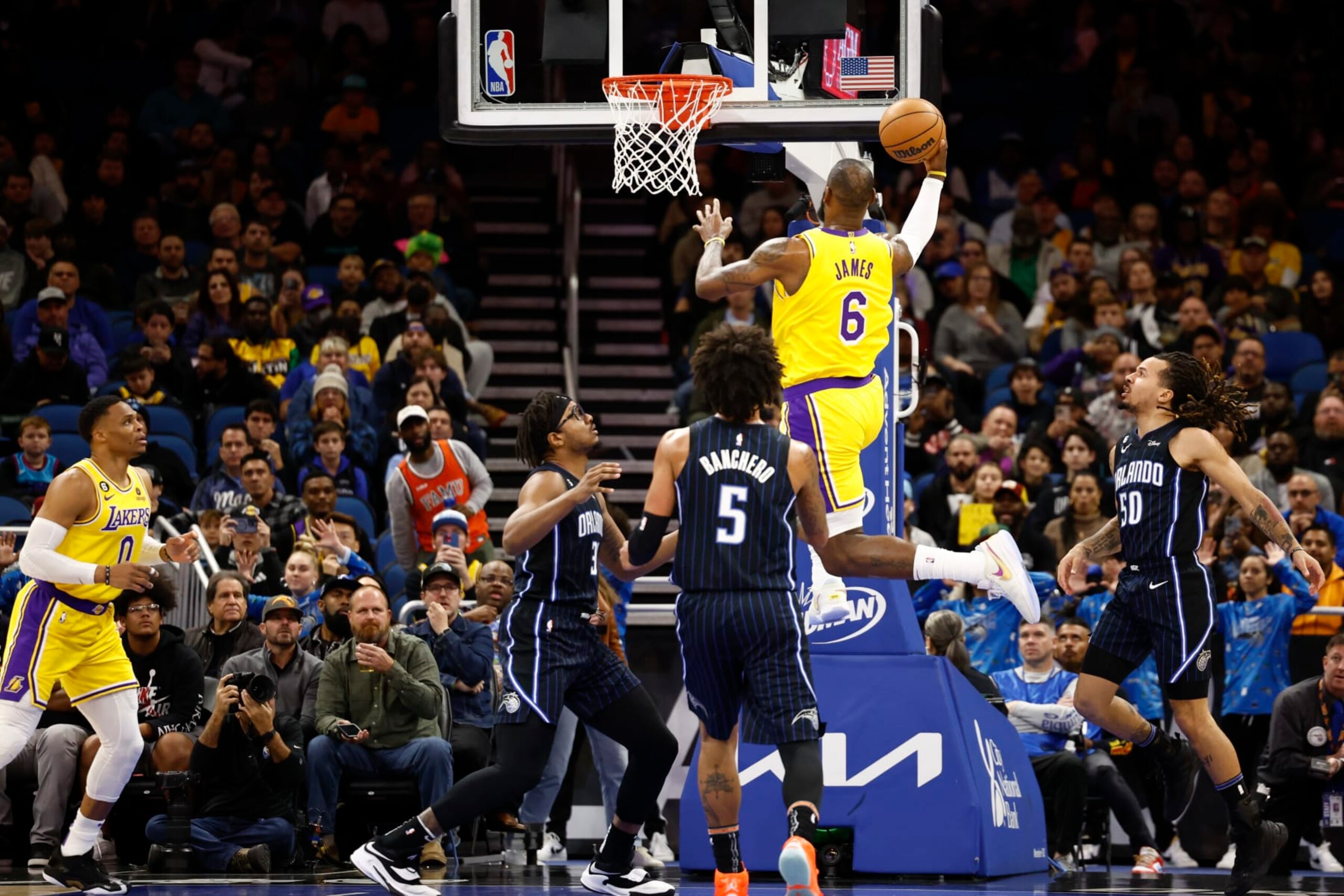 ORLANDO, FLORIDA - DECEMBER 27: LeBron James #6 of the Los Angeles Lakers lays the ball up against the Orlando Magic during the first quarter at Amway Center on December 27, 2022 in Orlando, Florida. NOTE TO USER: User expressly acknowledges and agrees that, by downloading and or using this photograph, User is consenting to the terms and conditions of the Getty Images License Agreement. (Photo by Douglas P. DeFelice/Getty Images) ORLANDO, FLORIDA - DECEMBER 27: LeBron James #6 of the Los Angeles Lakers lays the ball up against the Orlando Magic during the first quarter at Amway Center on December 27, 2022 in Orlando, Florida. NOTE TO USER: User expressly acknowledges and agrees that, by downloading and or using this photograph, User is consenting to the terms and conditions of the Getty Images License Agreement. (Photo by Douglas P. DeFelice/Getty Images)