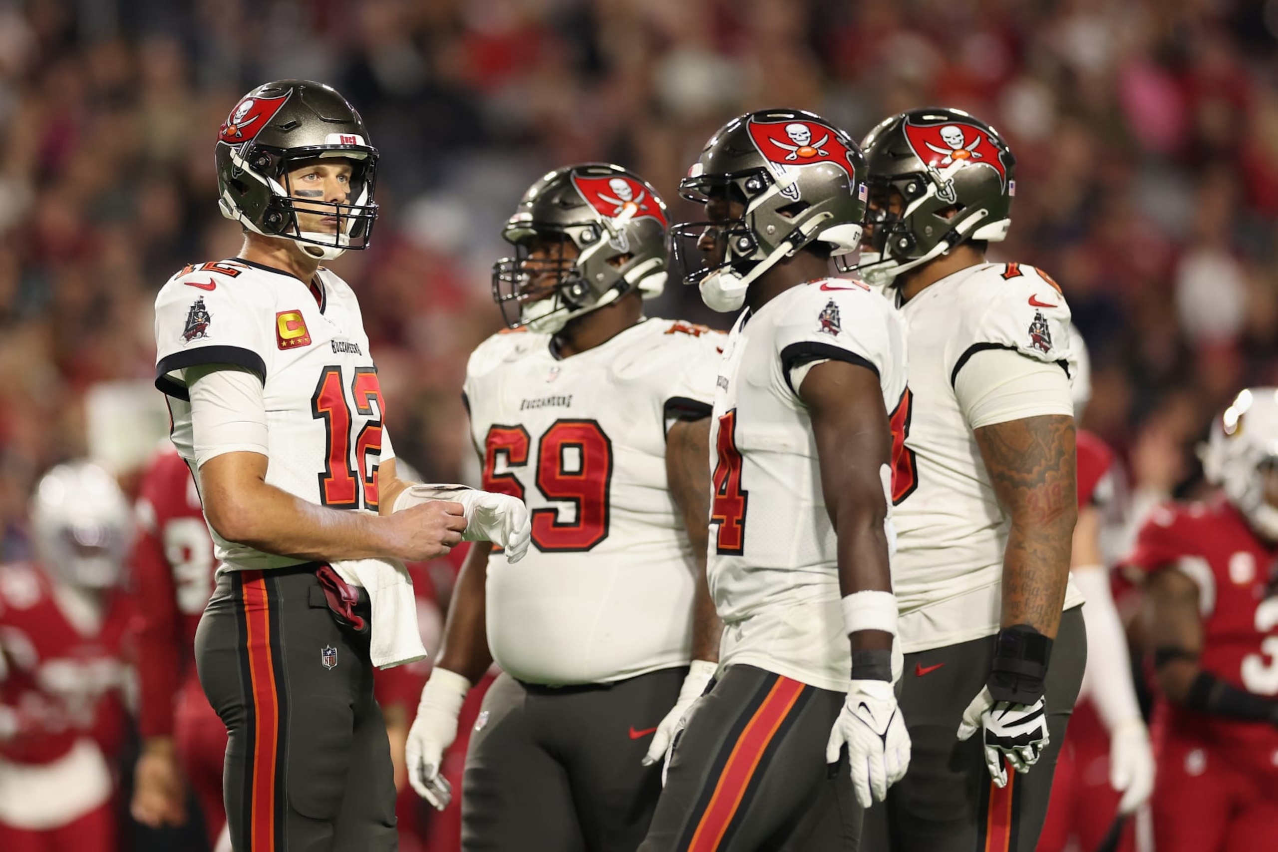 GLENDALE, ARIZONA - DECEMBER 25: Quarterback Tom Brady #12 of the Tampa Bay Buccaneers during the NFL game at State Farm Stadium on December 25, 2022 in Glendale, Arizona. The Buccaneers defeated the Cardinals 19-16 in overtime.  (Photo by Christian Petersen/Getty Images)