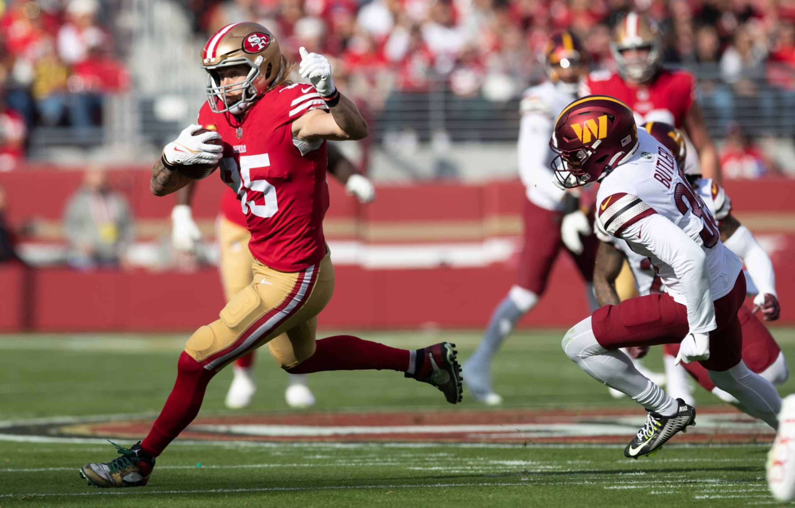 SANTA CLARA, CA - DECEMBER 24: George Kittle #85 of the San Francisco 49ers runs after making a catch during the game against the Washington Commanders at Levi's Stadium on December 24, 2022 in Santa Clara, California. The 49ers defeated the Commanders 37-20. (Photo by Michael Zagaris/San Francisco 49ers/Getty Images)