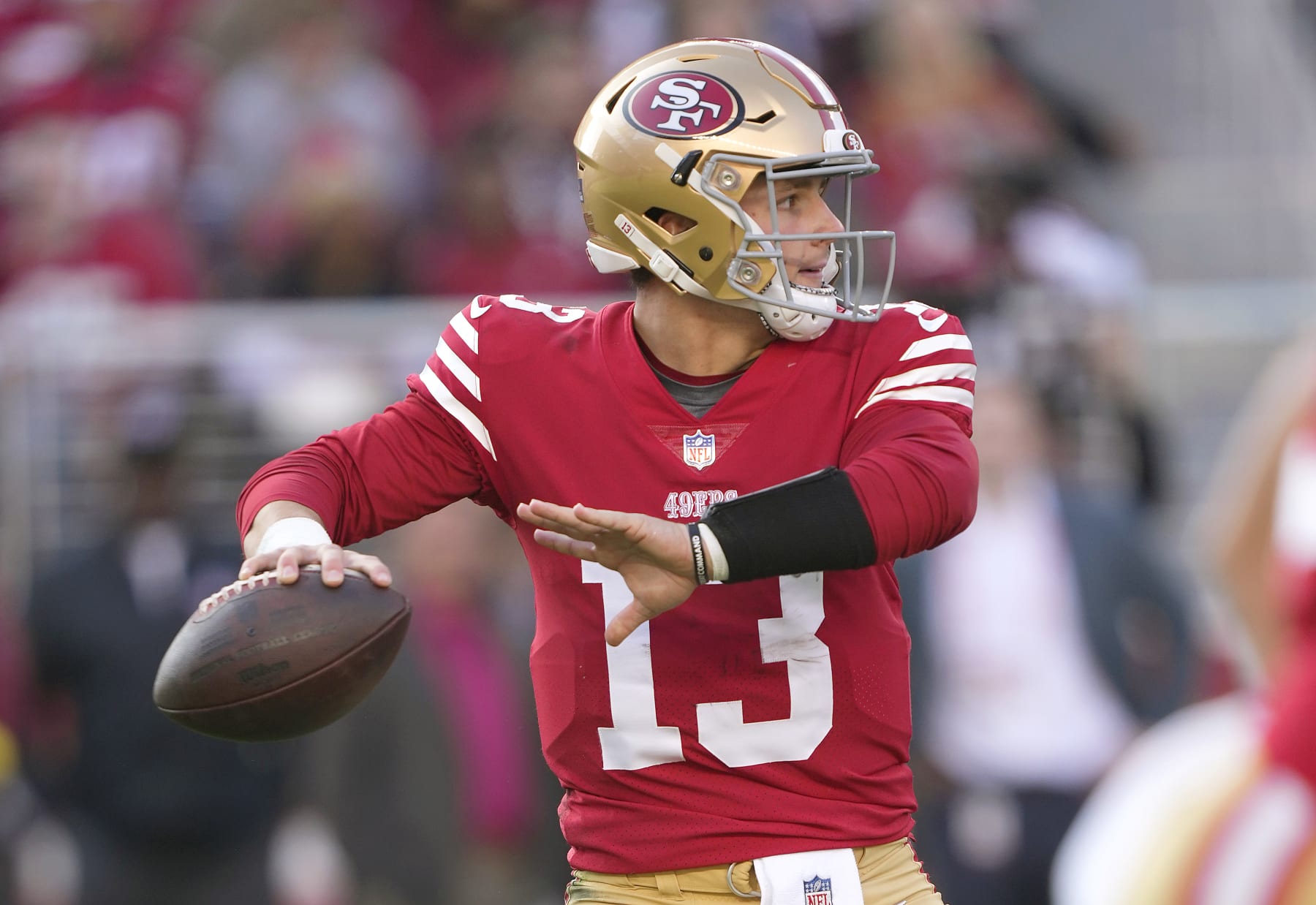 SANTA CLARA, CALIFORNIA - DECEMBER 24: Brock Purdy #13 of the San Francisco 49ers drops back to pass against the Washington Commanders during the second quarter of an NFL football game at Levi's Stadium on December 24, 2022 in Santa Clara, California. (Photo by Thearon W. Henderson/Getty Images)