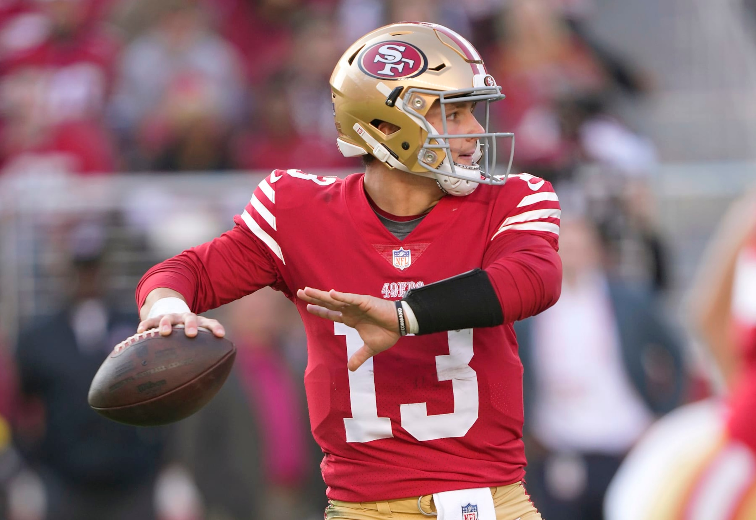 SANTA CLARA, CALIFORNIA - DECEMBER 24: Brock Purdy #13 of the San Francisco 49ers drops back to pass against the Washington Commanders during the second quarter of an NFL football game at Levi's Stadium on December 24, 2022 in Santa Clara, California. (Photo by Thearon W. Henderson/Getty Images)