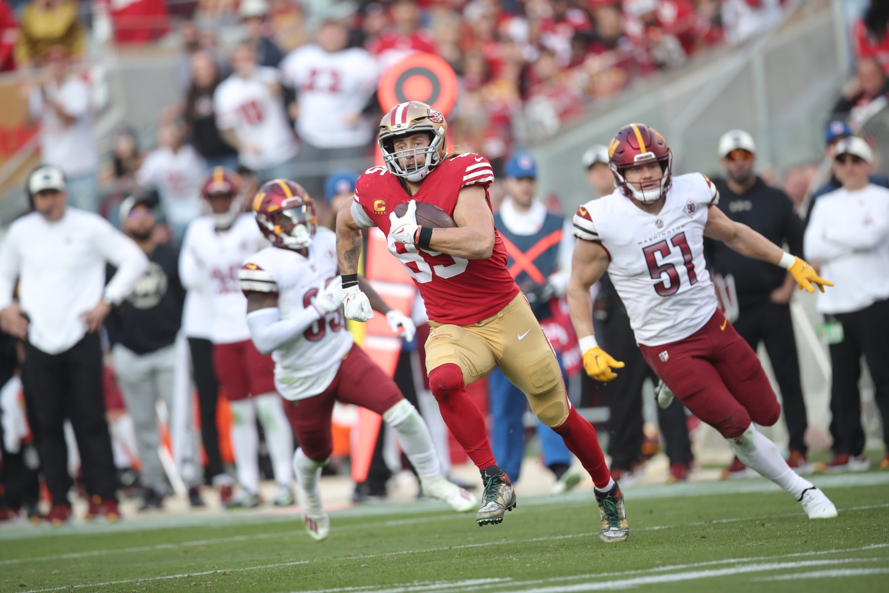SANTA CLARA, CA - DECEMBER 24: George Kittle #85 of the San Francisco 49ers heads to the end zone on a 33-yard touchdown catch during the game against the Washington Commanders at Levi's Stadium on December 24, 2022 in Santa Clara, California. The 49ers defeated the Commanders 37-20. (Photo by Michael Zagaris/San Francisco 49ers/Getty Images)